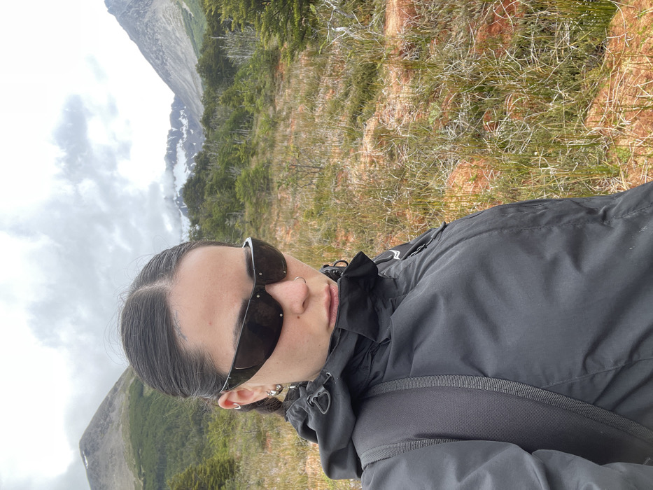 Hiker explores berry-filled landscape near Ushuaia, Argentina