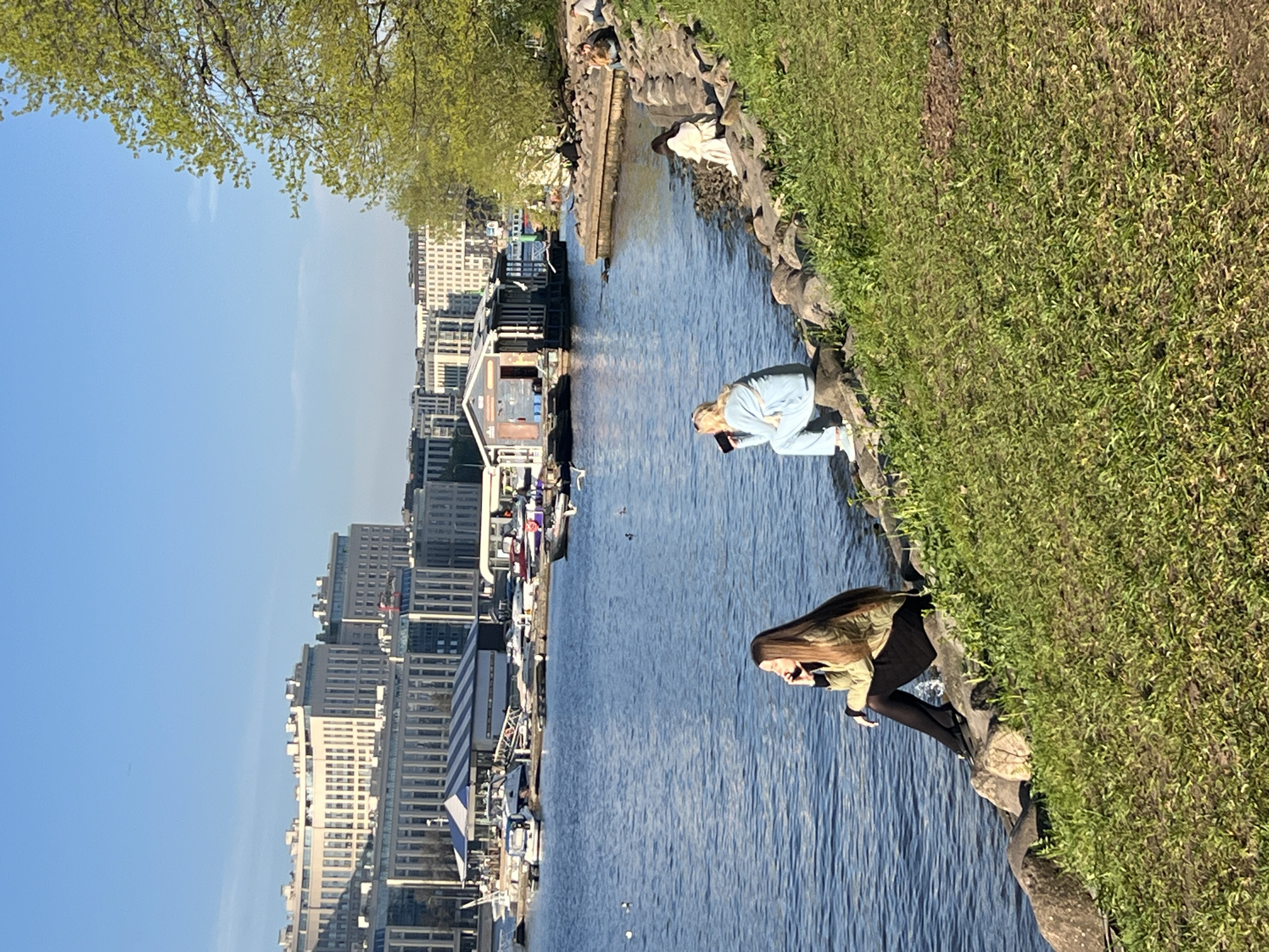 Two people gather at Saint Petersburg waterfront embankment