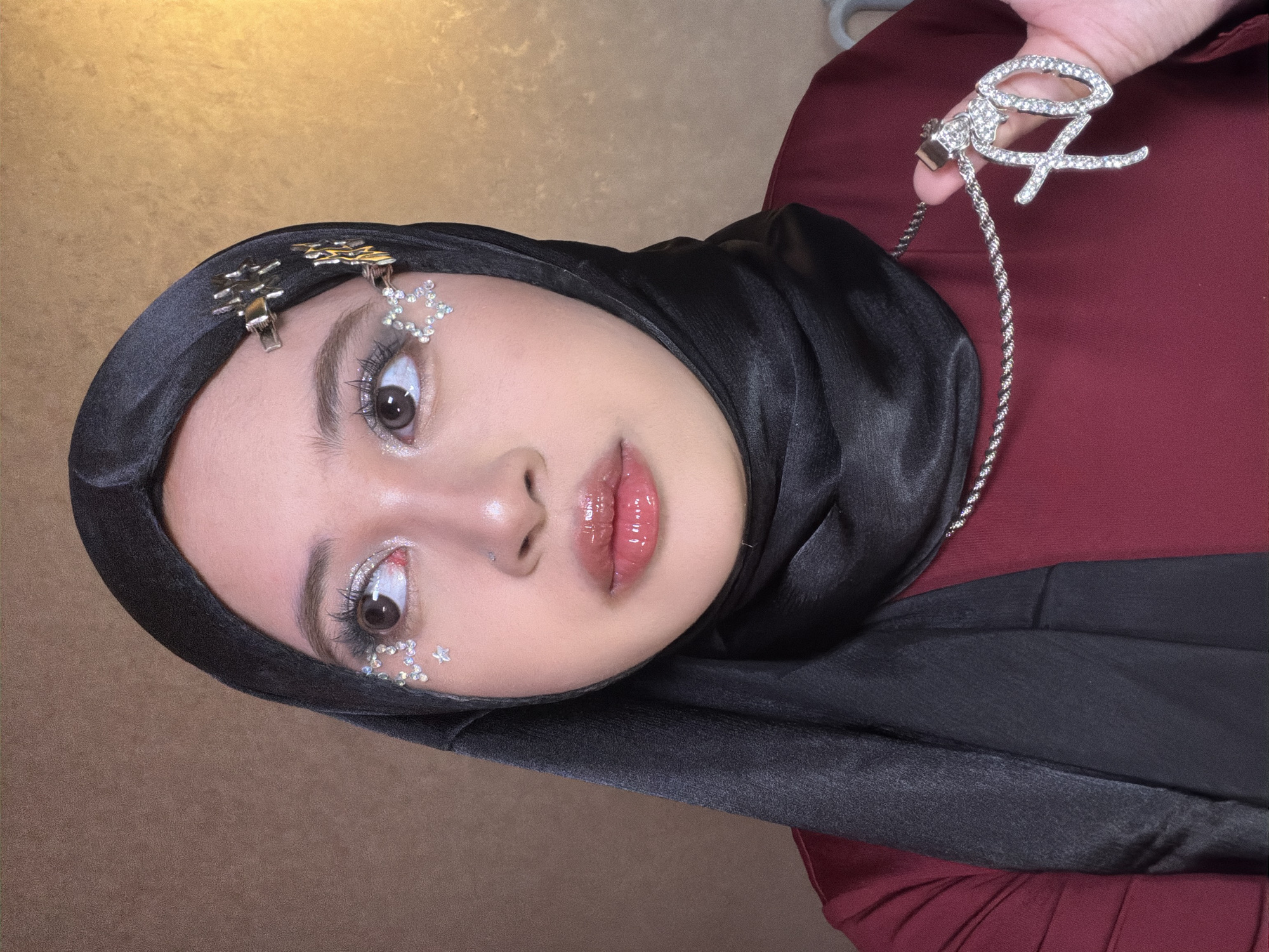 Glam makeup session in East Jakarta with rhinestones and glitter