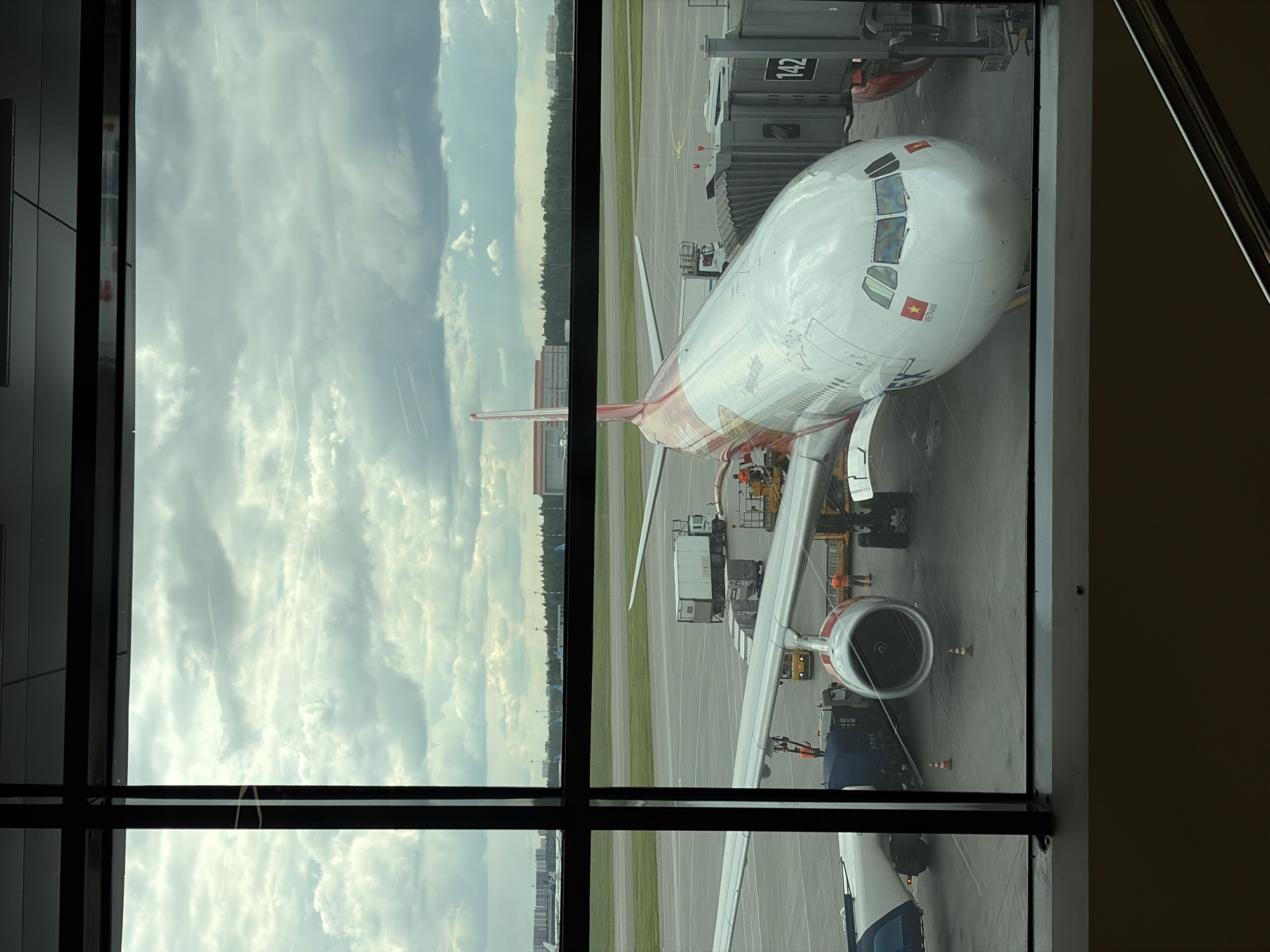 Mother and baby travel through Moscow's Sheremetyevo Airport