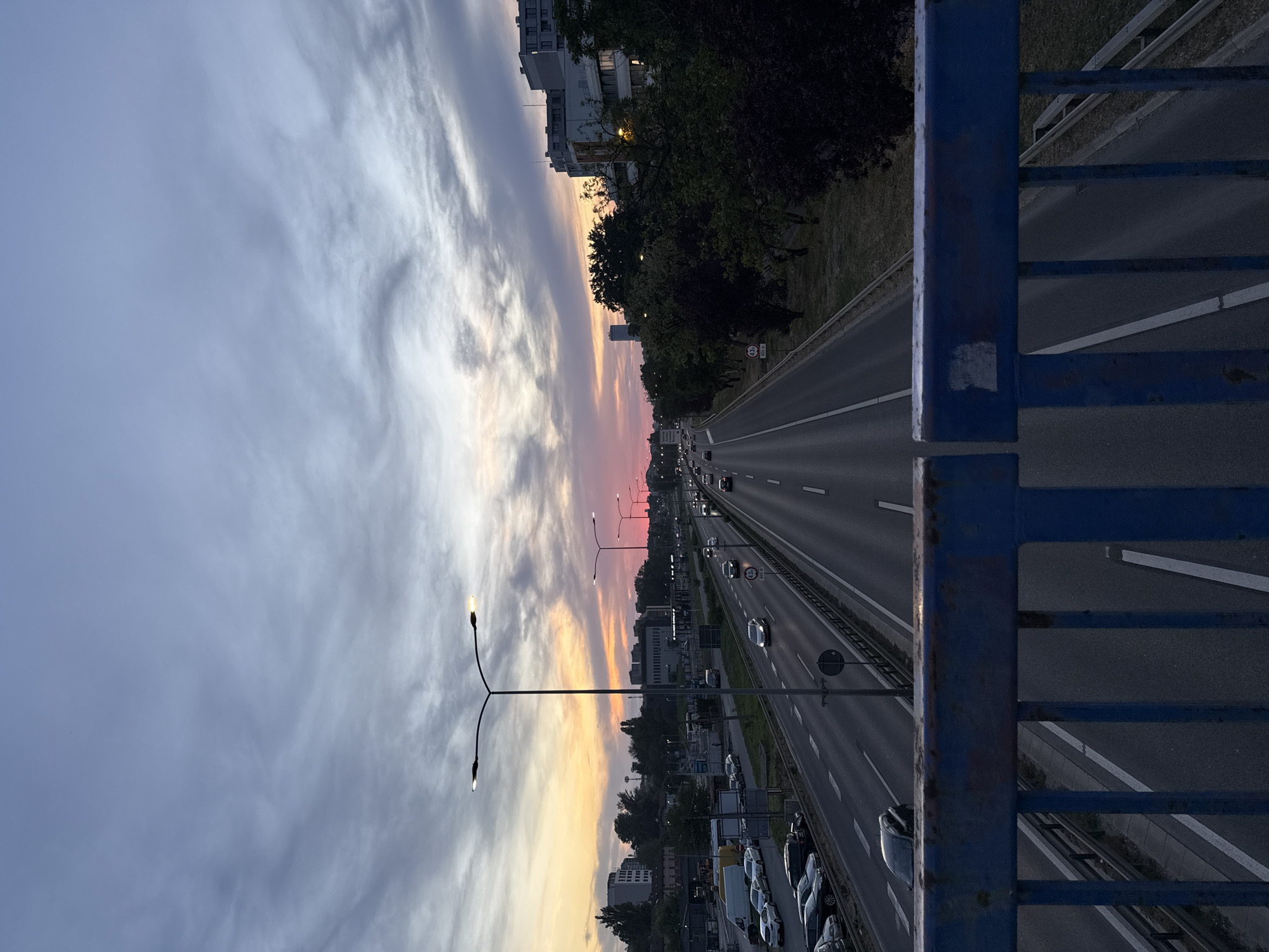 Evening highway traffic observed from bridge in Belgrade suburb