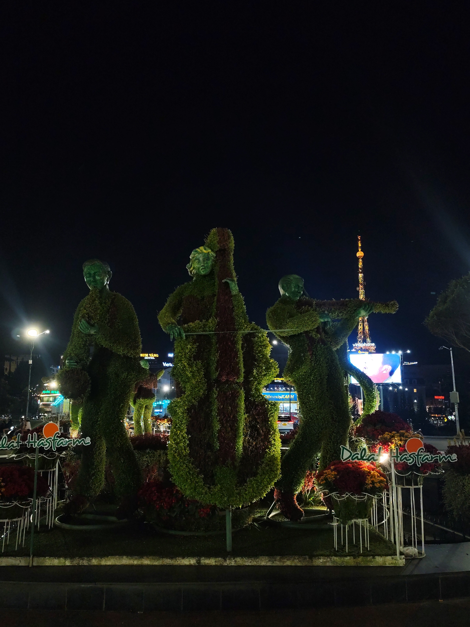Nighttime scenes captured across illuminated Da Lat, Vietnam attractions