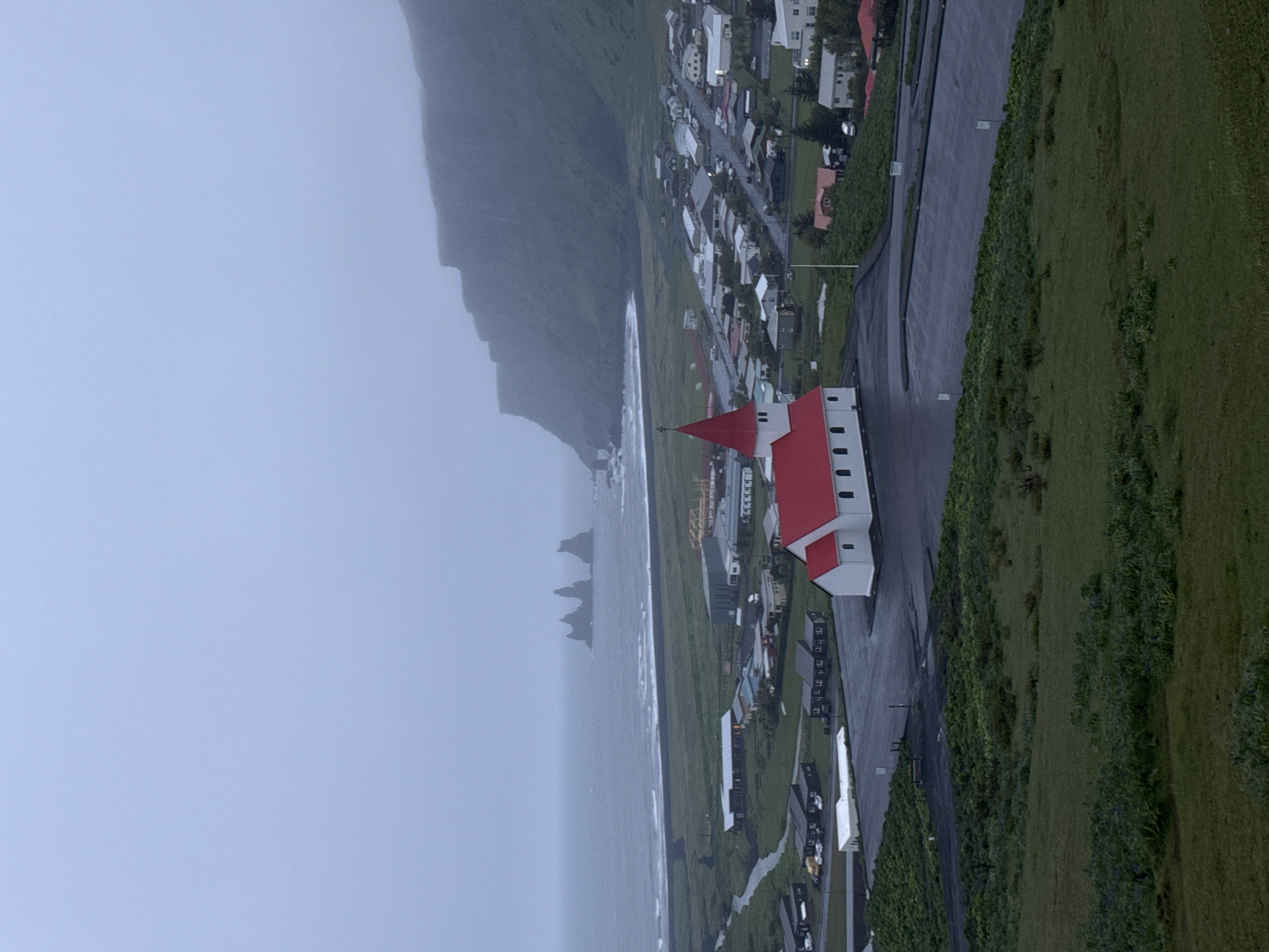 Rainy evening views of iconic Vikurkirkja Church documented in Vik