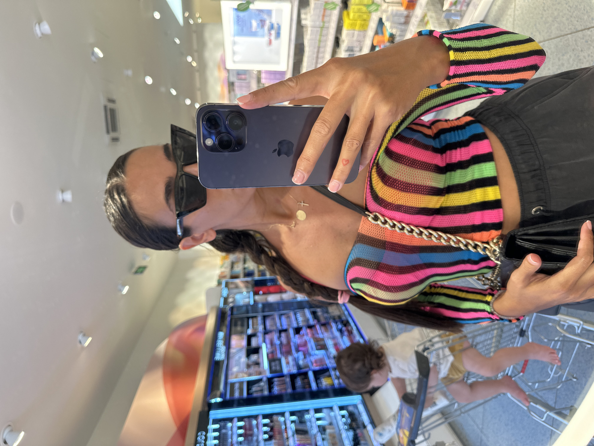 Mirror selfie in a Pernik beauty store, ring light and all