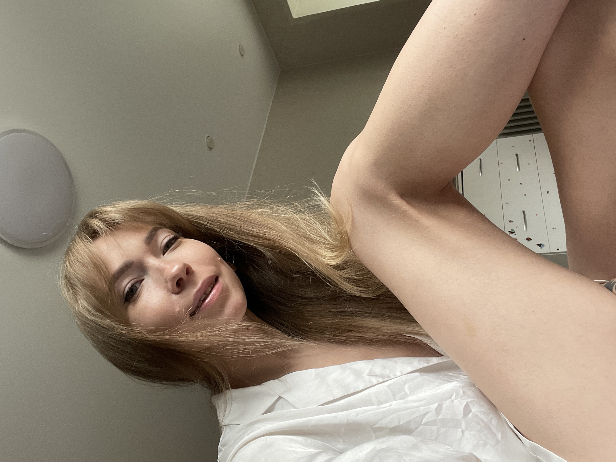 Woman documents early morning routine in Perm apartment selfies