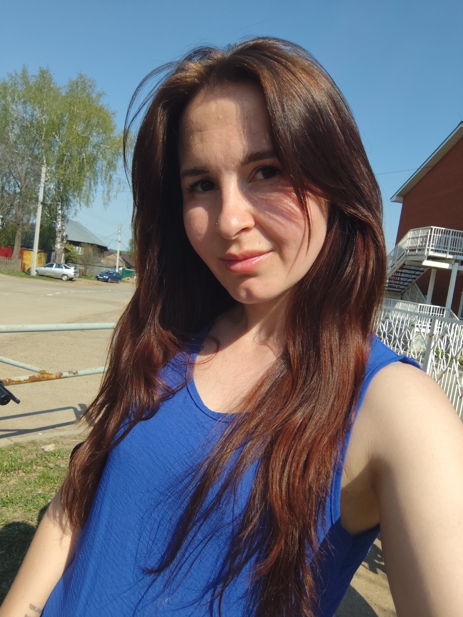 Woman enjoys spring day with baby in Фоки, Russia