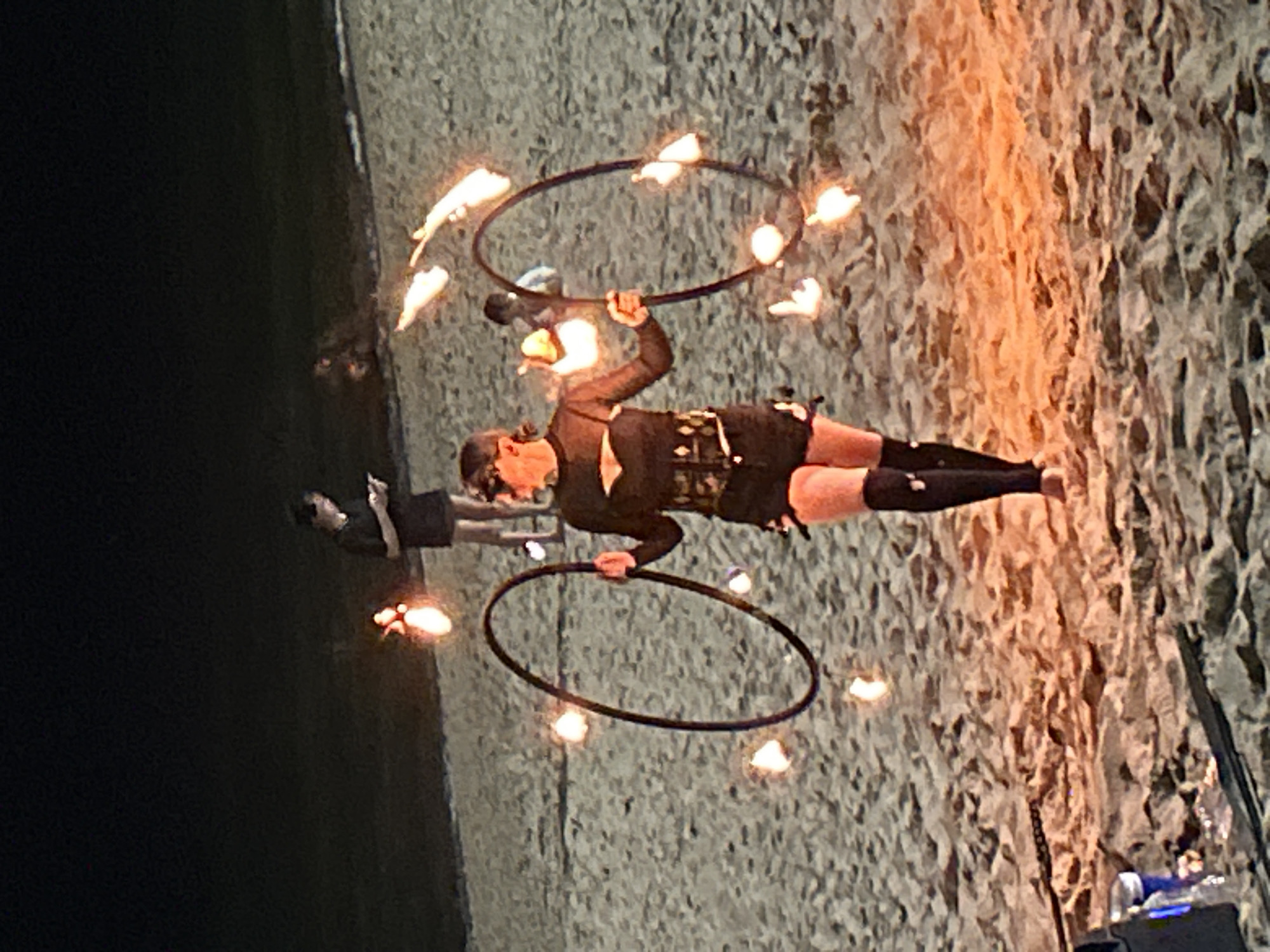 Fire dancer performs on Nha Trang beach amid bustling nightlife
