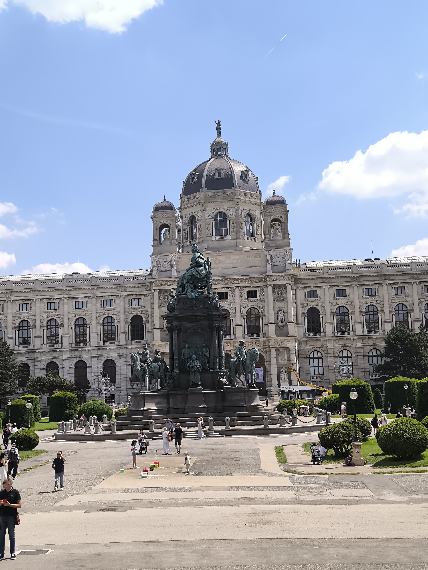 Tourist documents Vienna museum district tour on sunny morning