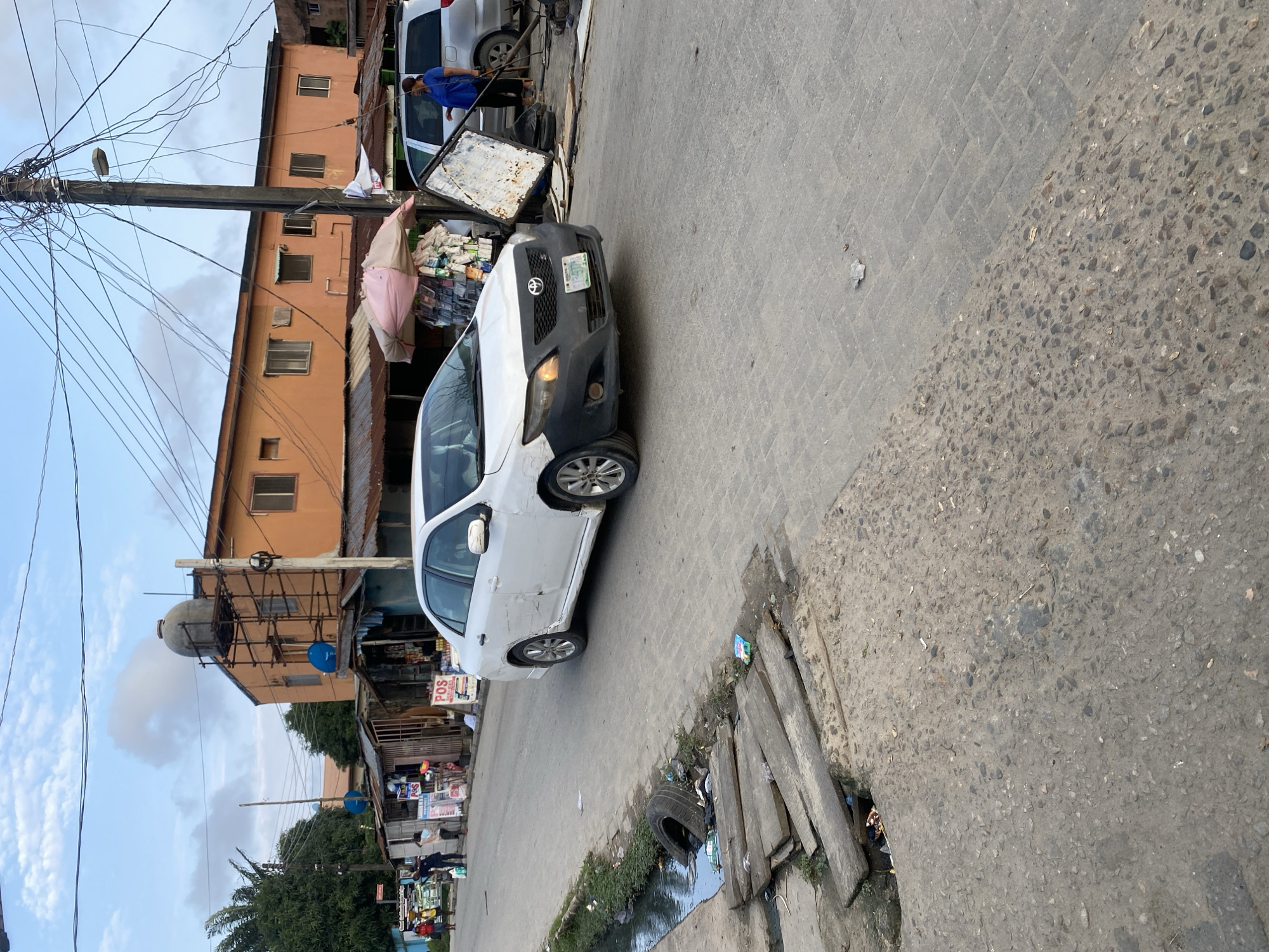 Street life in a busy West African urban neighborhood