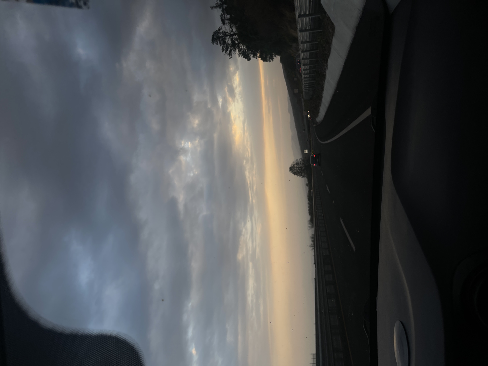 Late night highway travel documented under heavy clouds near Mexico City