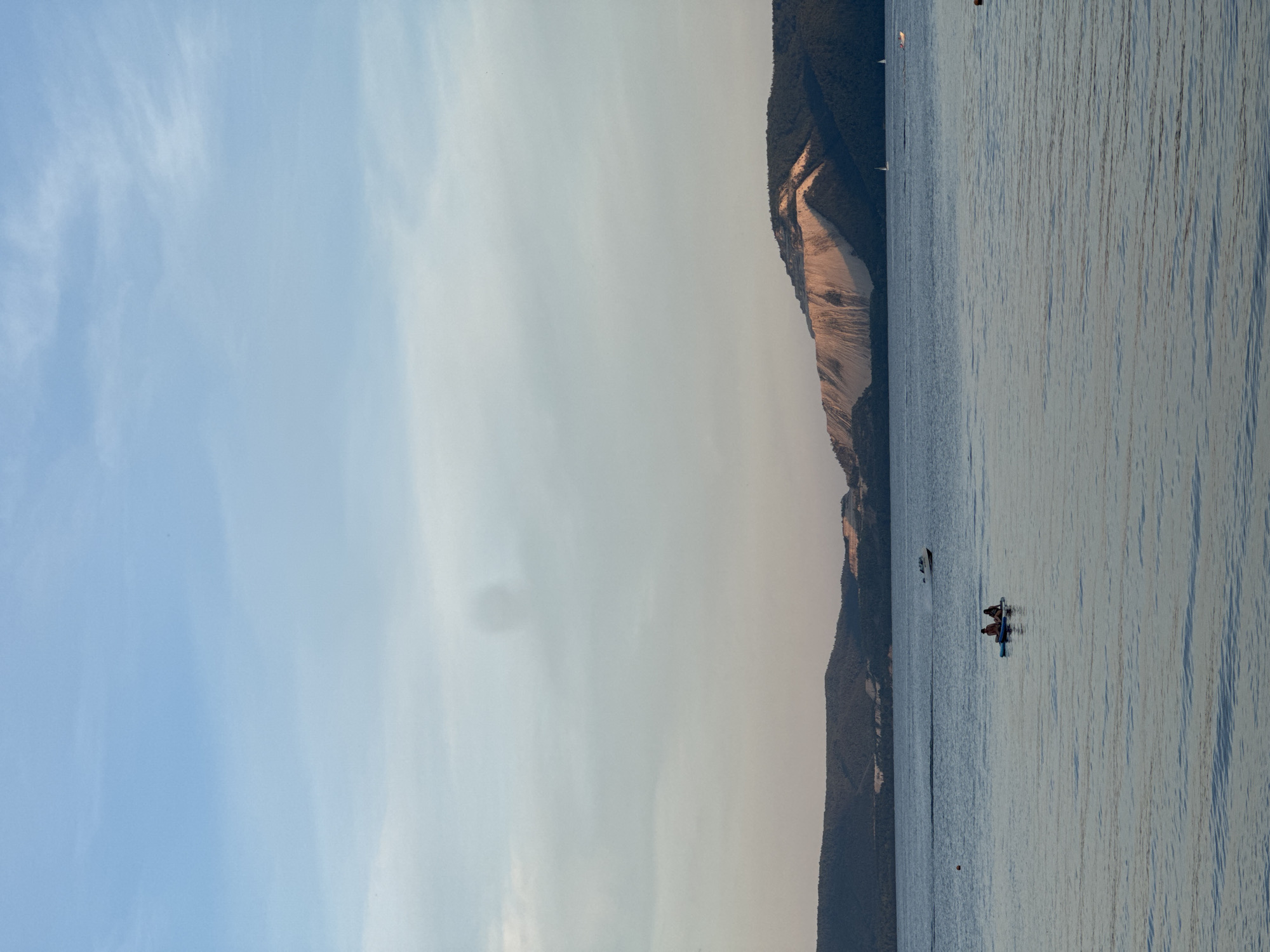 Beach concert and water sports on a calm summer afternoon