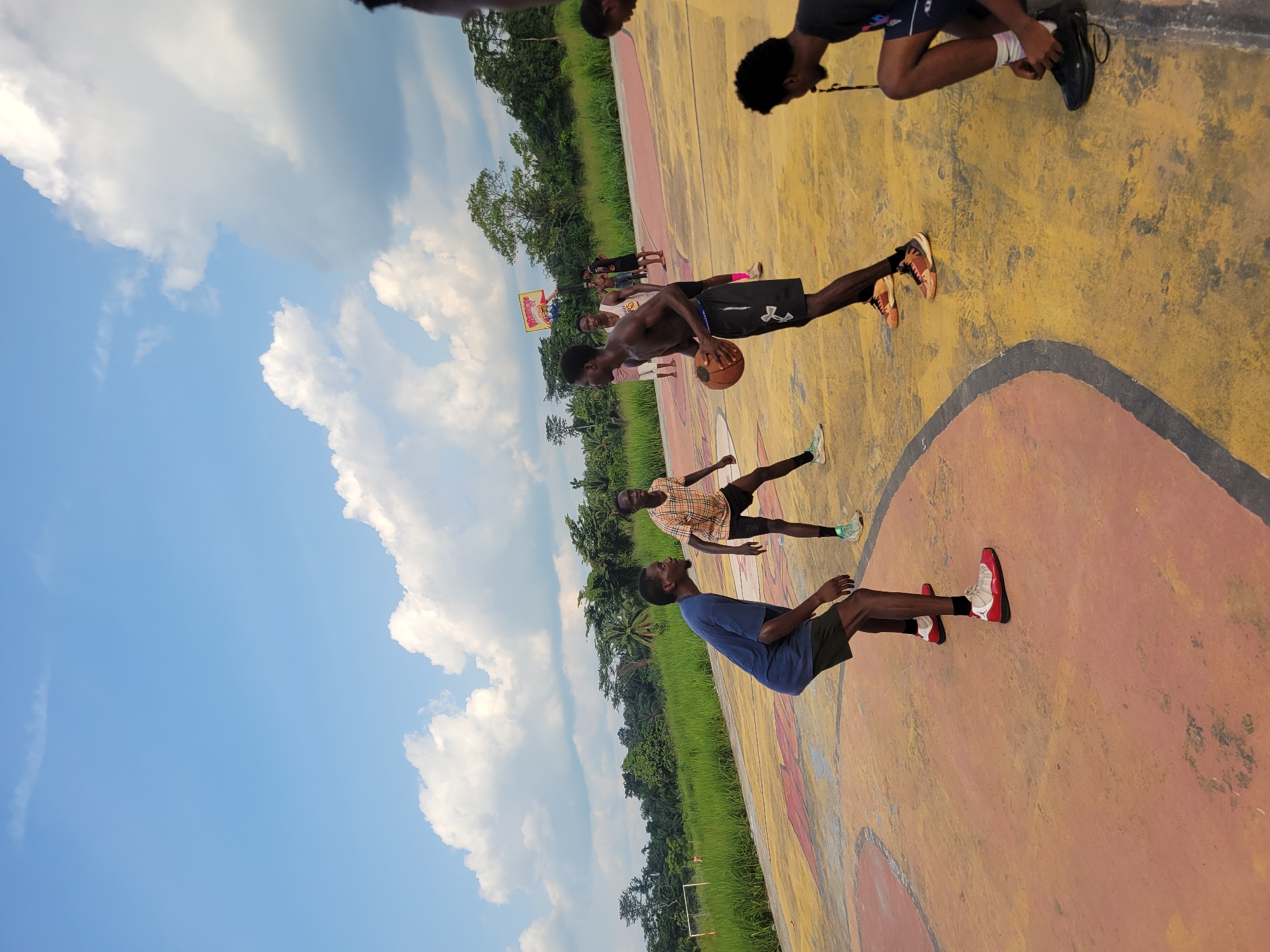 Afternoon pickup basketball and street life in Egbagu, Nigeria