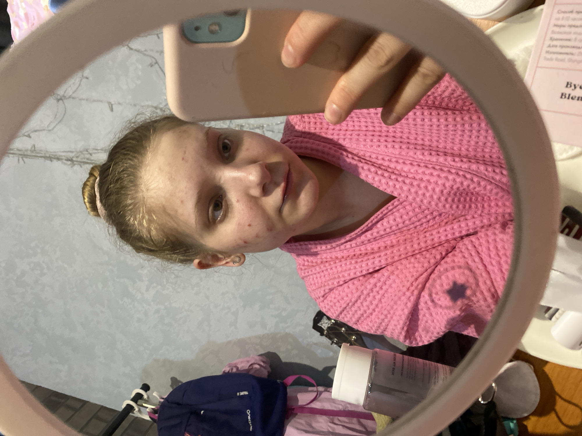 Woman documents skincare routine in mirror selfies in Chaikovsky