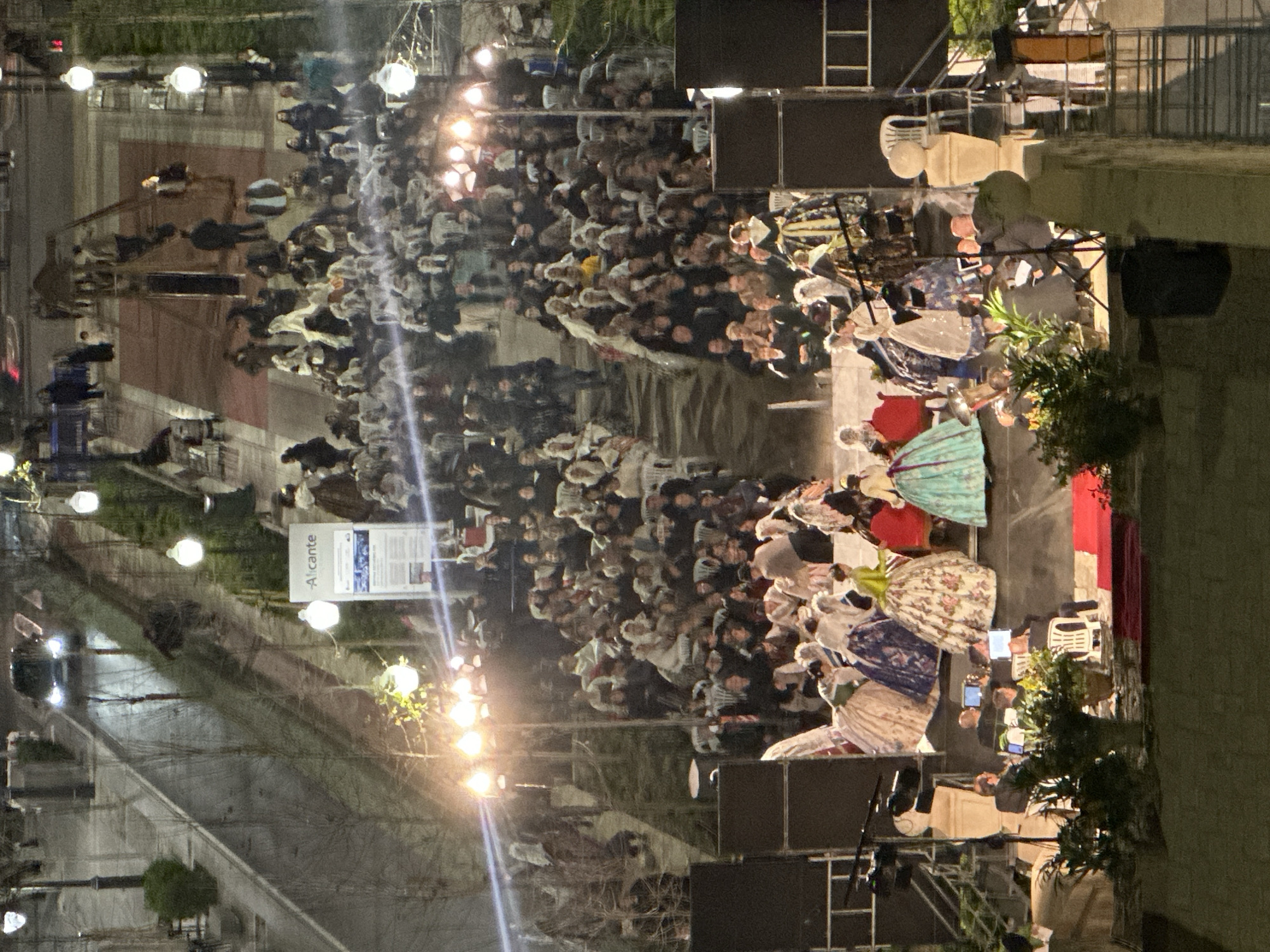Large crowd gathers around stage in Alicante, Spain