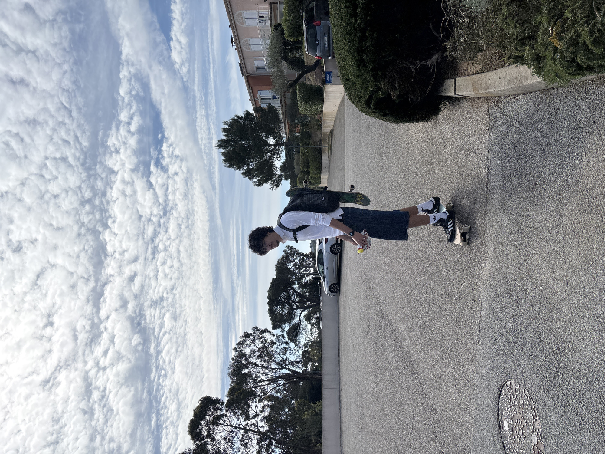 Young man skateboarding on street in Fréjus, France