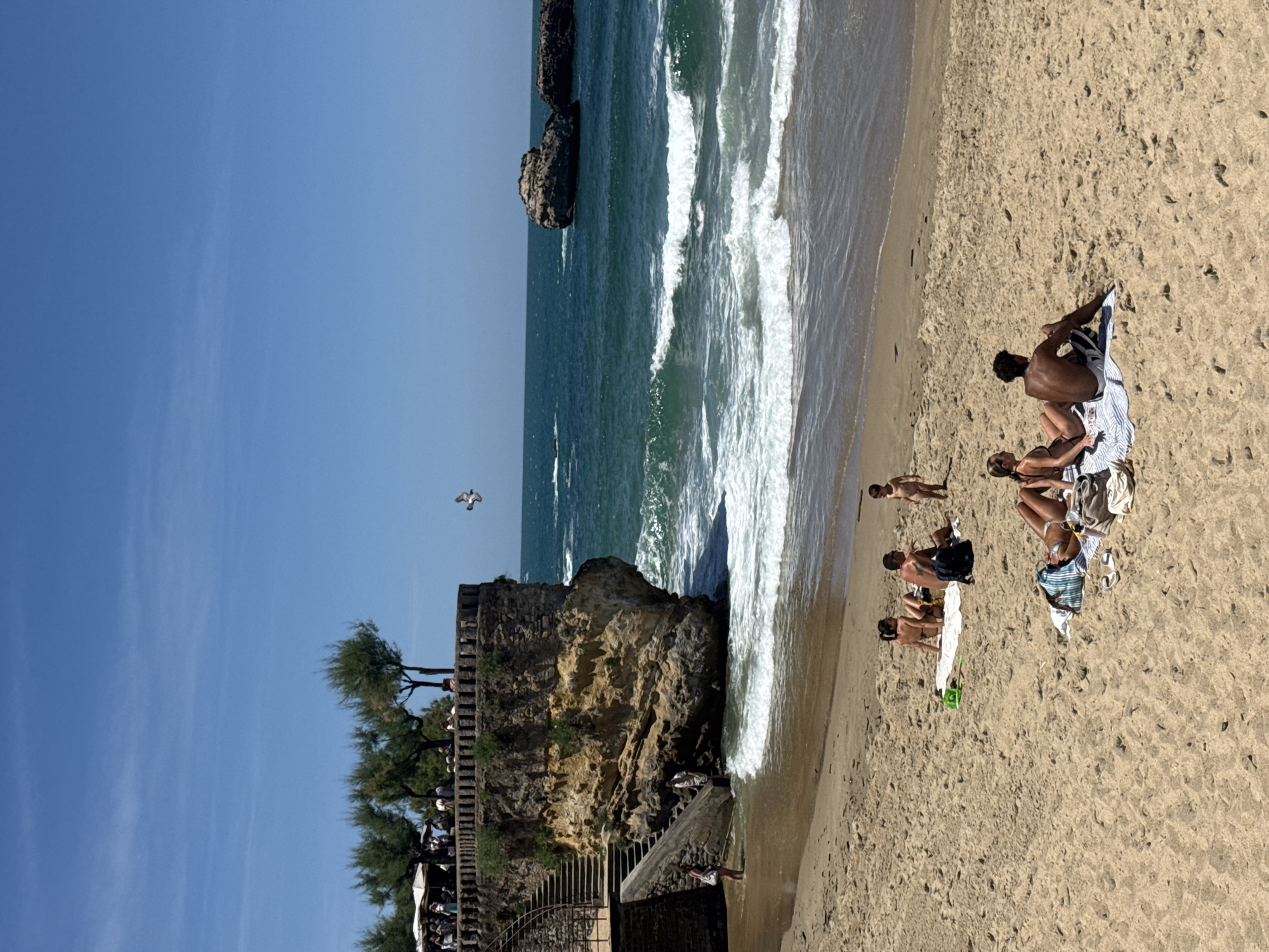 Beachgoers enjoy sunny afternoon at Biarritz's Rocher de la Vierge