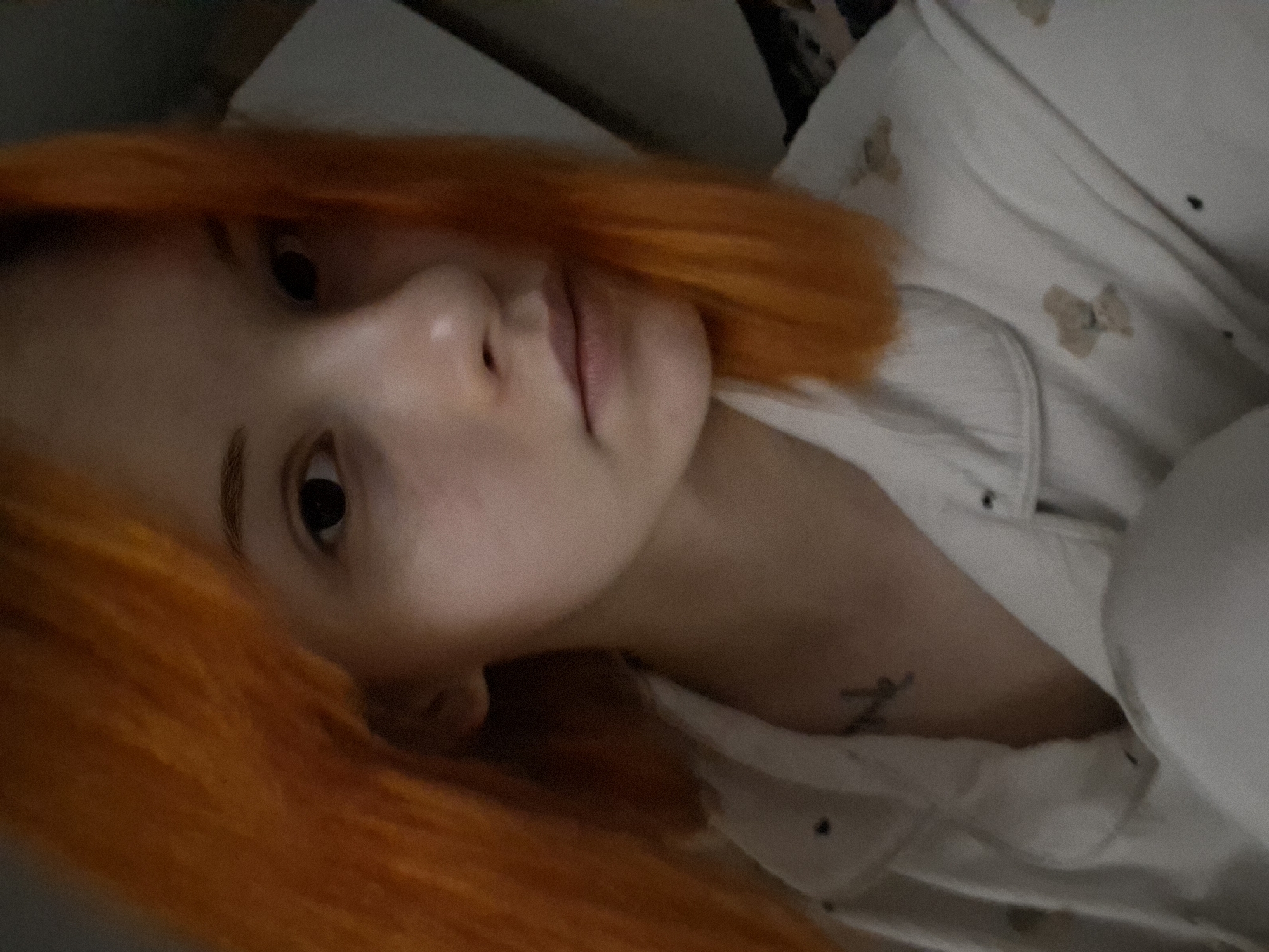 Orange-haired person photographed in casual selfie session, Chaikovsky