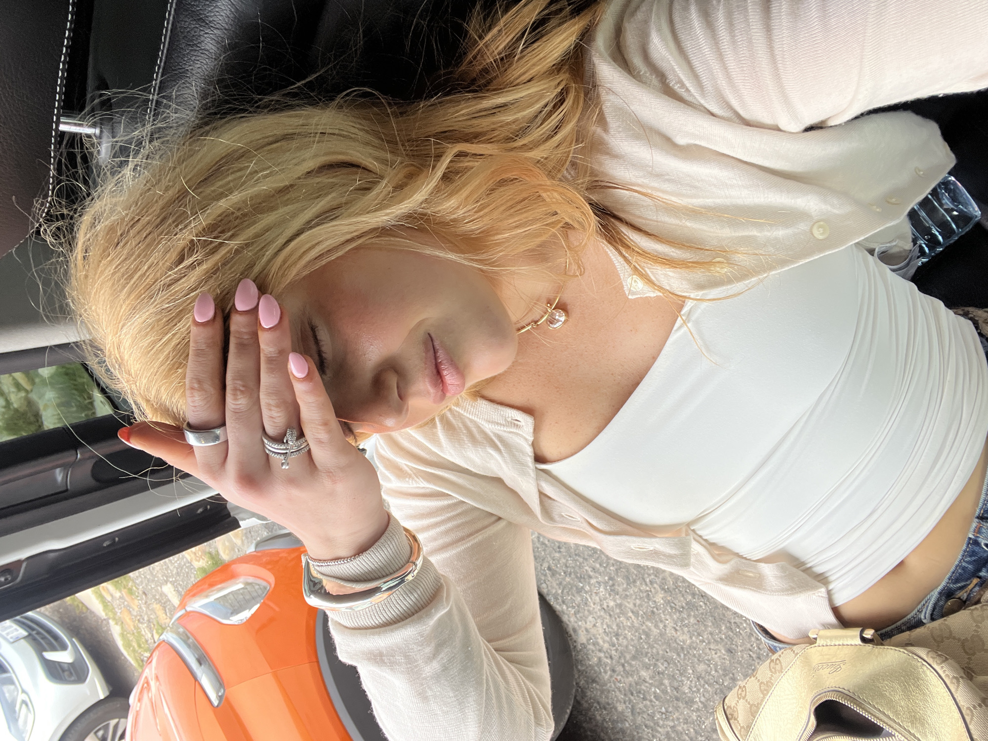 Woman observed resting in vehicle passenger seat in Cape Town