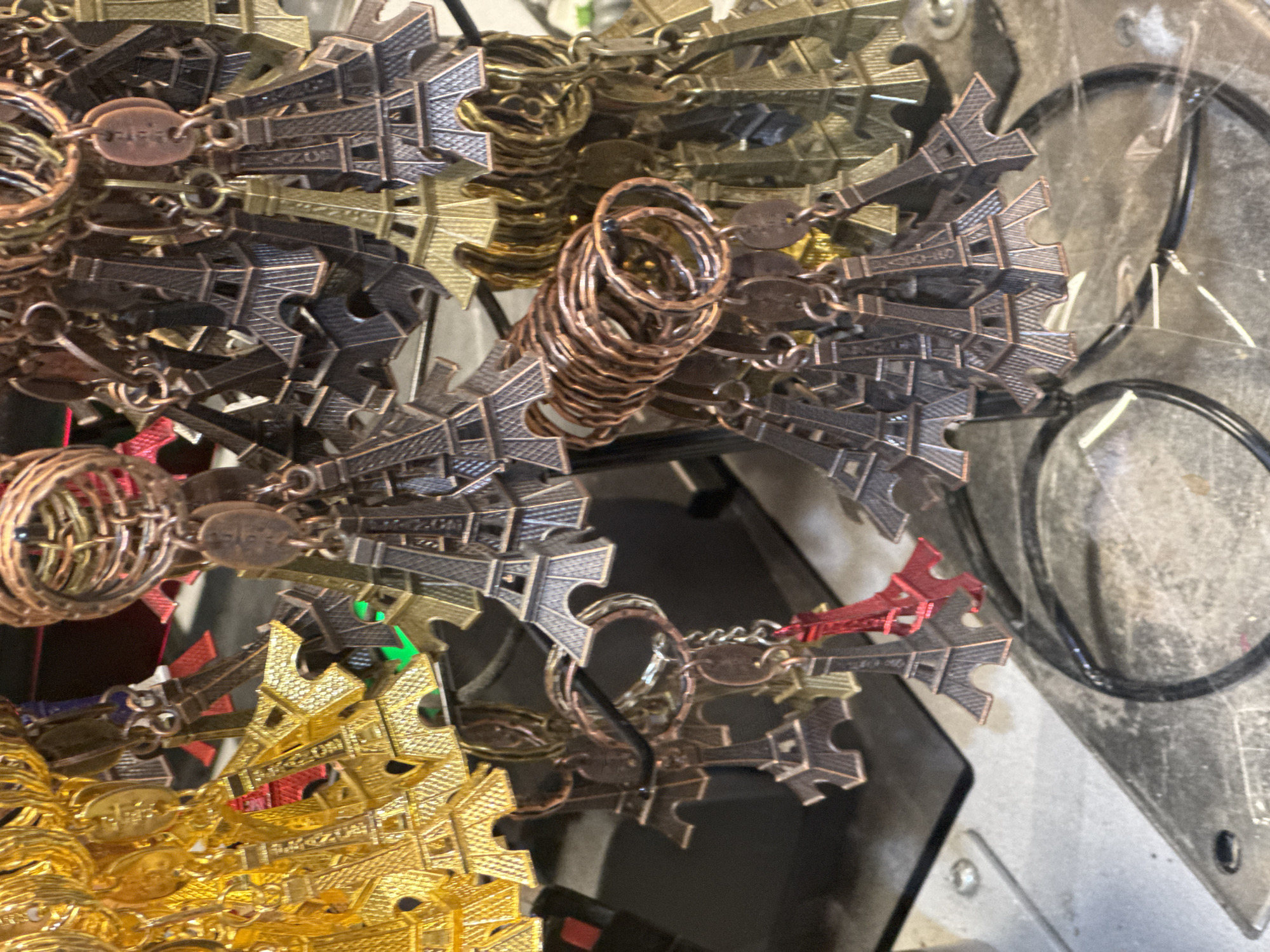 Gilded winged sculpture photographed atop Paris monument
