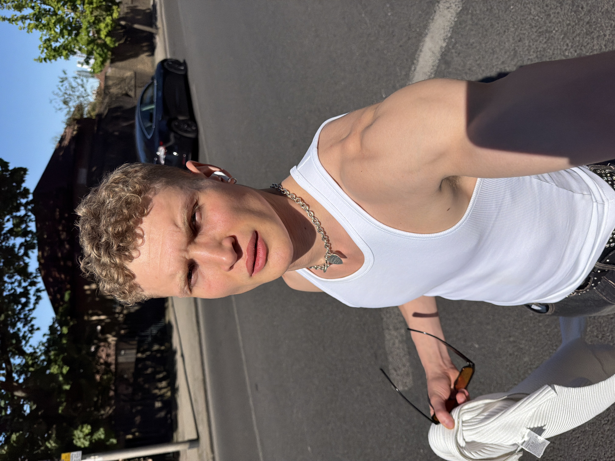 Young man photographed in bright London sunlight