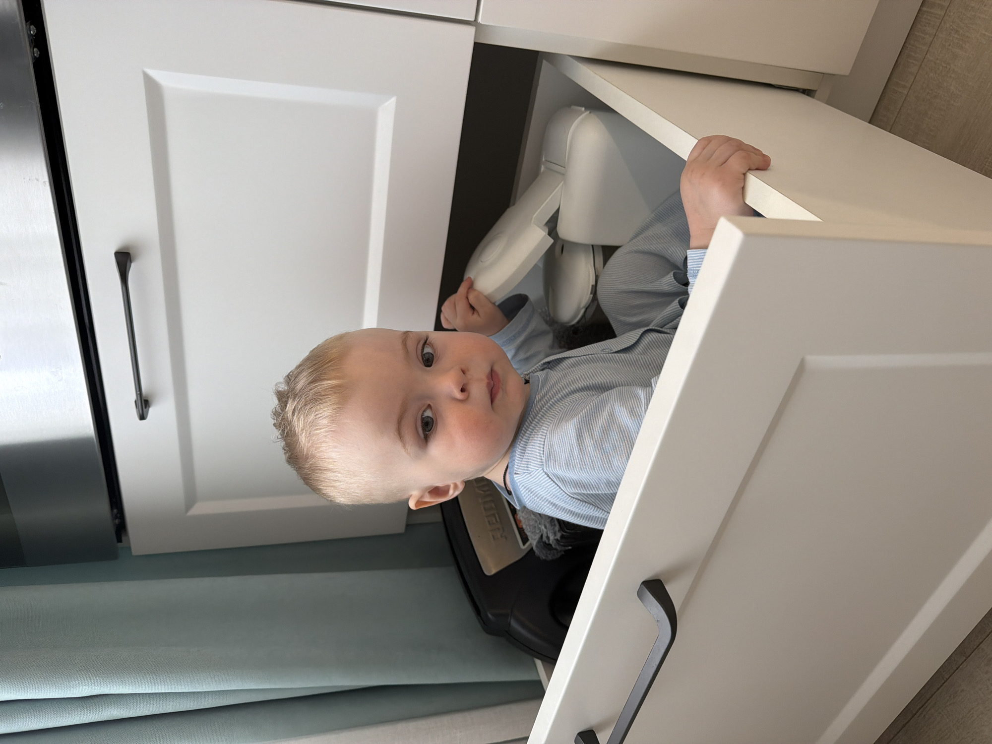 Morning domestic scenes captured in Votkinsk home with toddler, dog