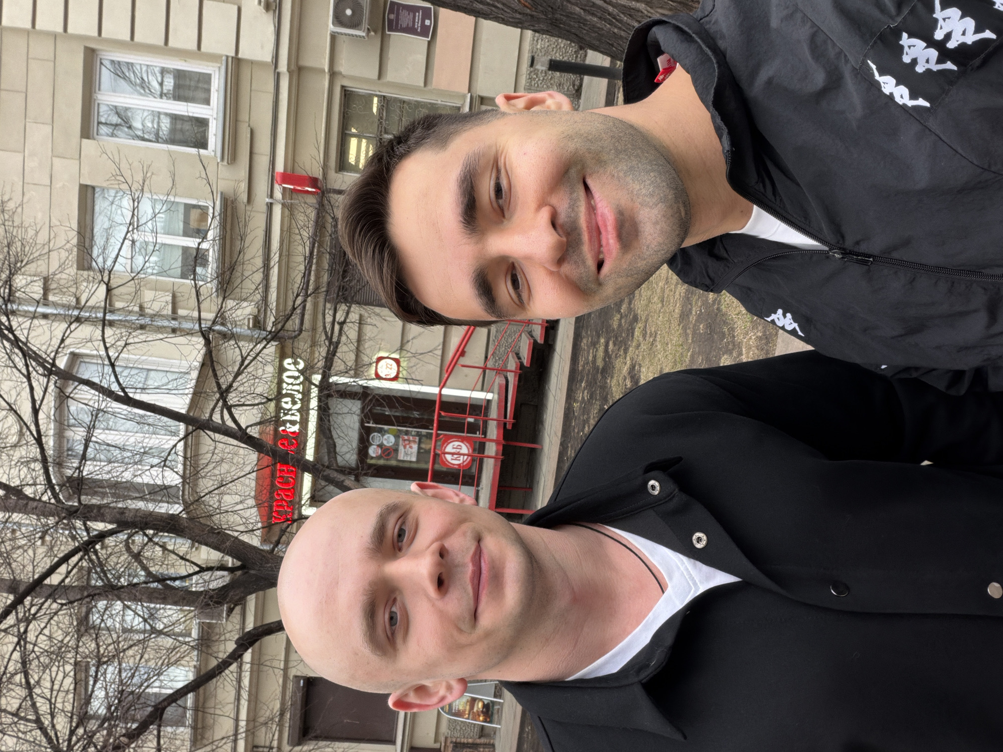 Two men photographed outdoors in Krasnoyarsk, Russia