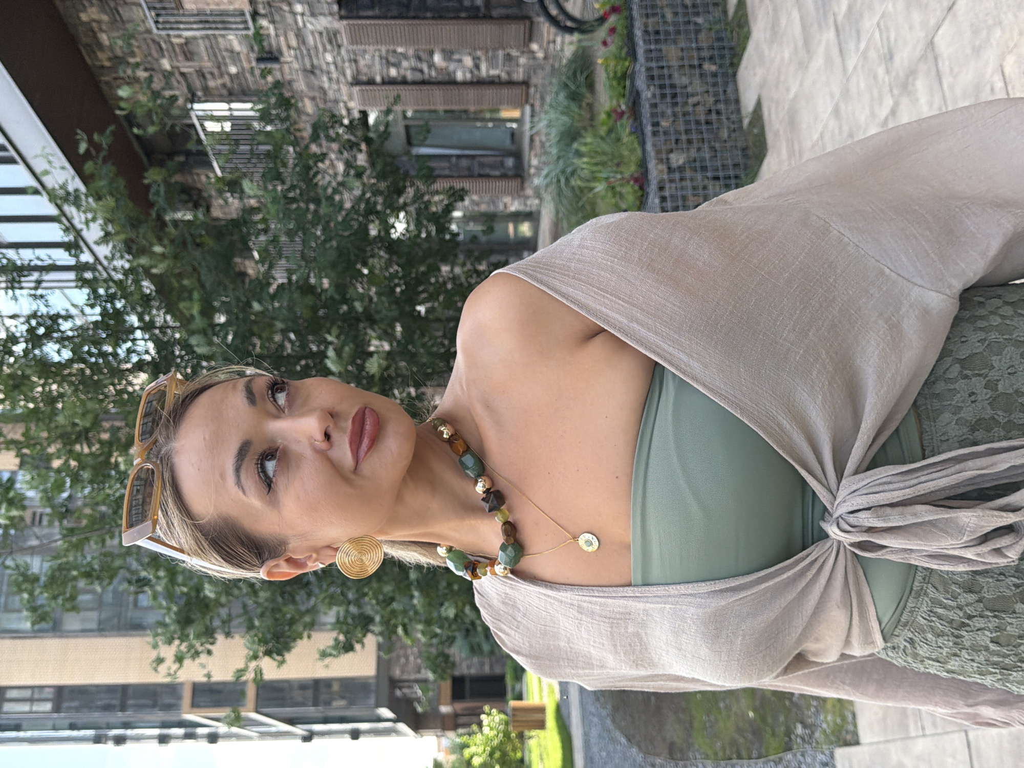 Outdoor portraits outside a modern Krasnoyarsk building, summer morning
