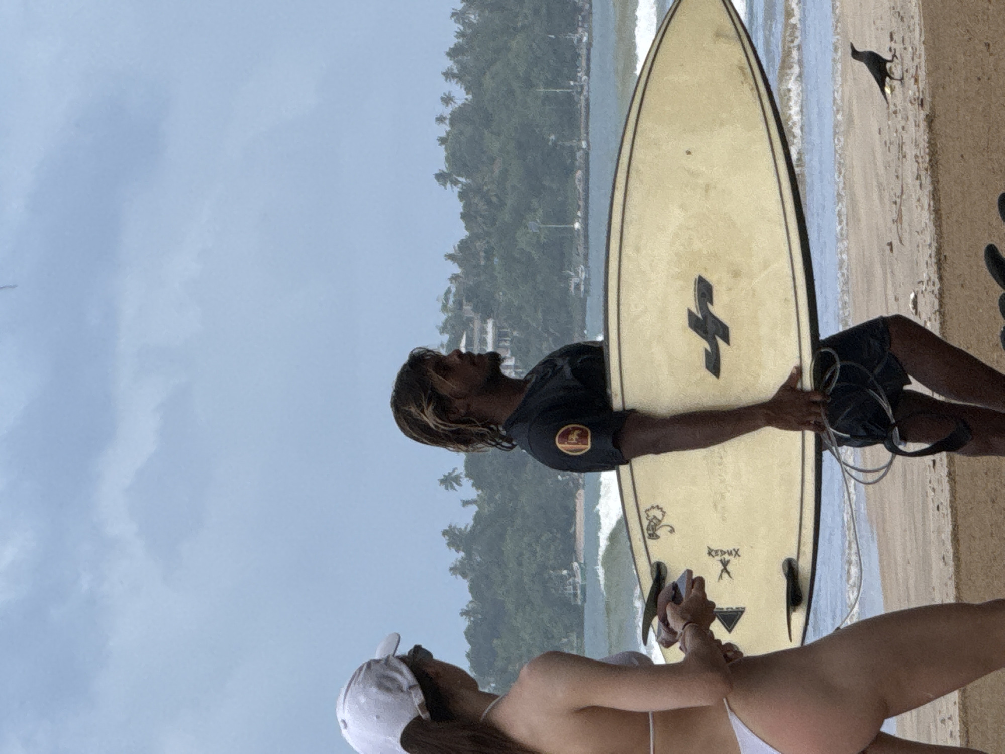 Surf session underway on Weligama Beach, Sri Lanka