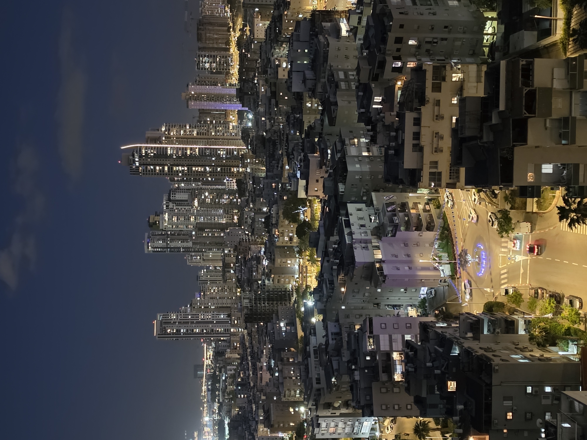 Aerial nighttime view captured over Bat Yam urban landscape