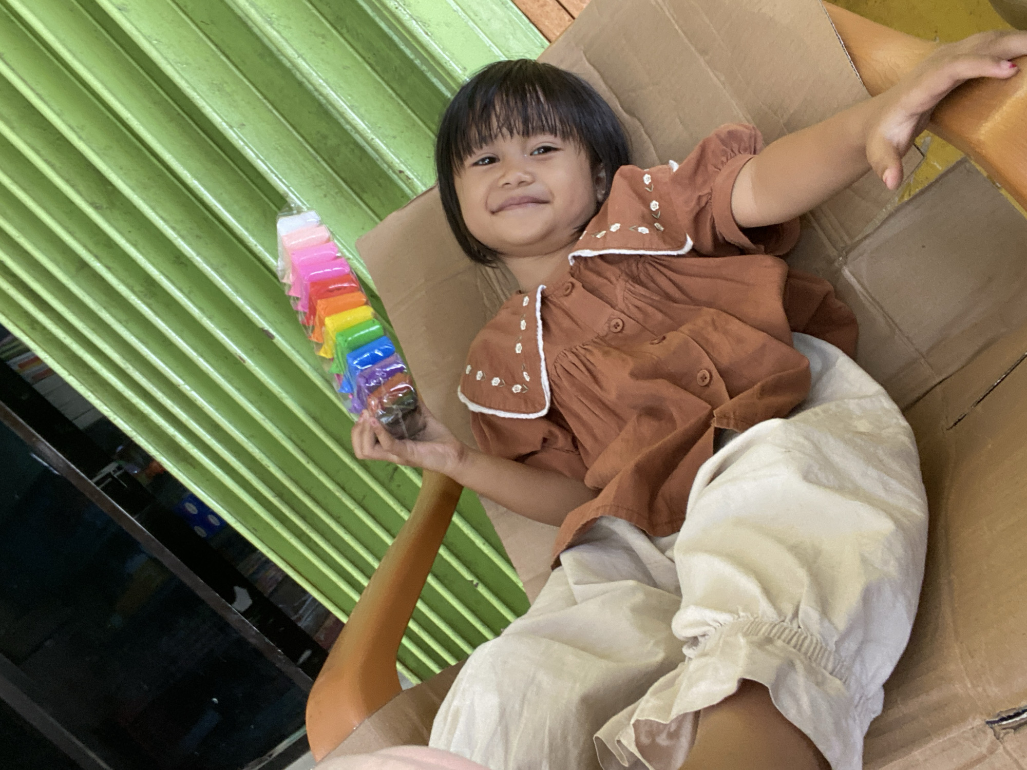 Modeling clay unboxing moment in Macege, Indonesia