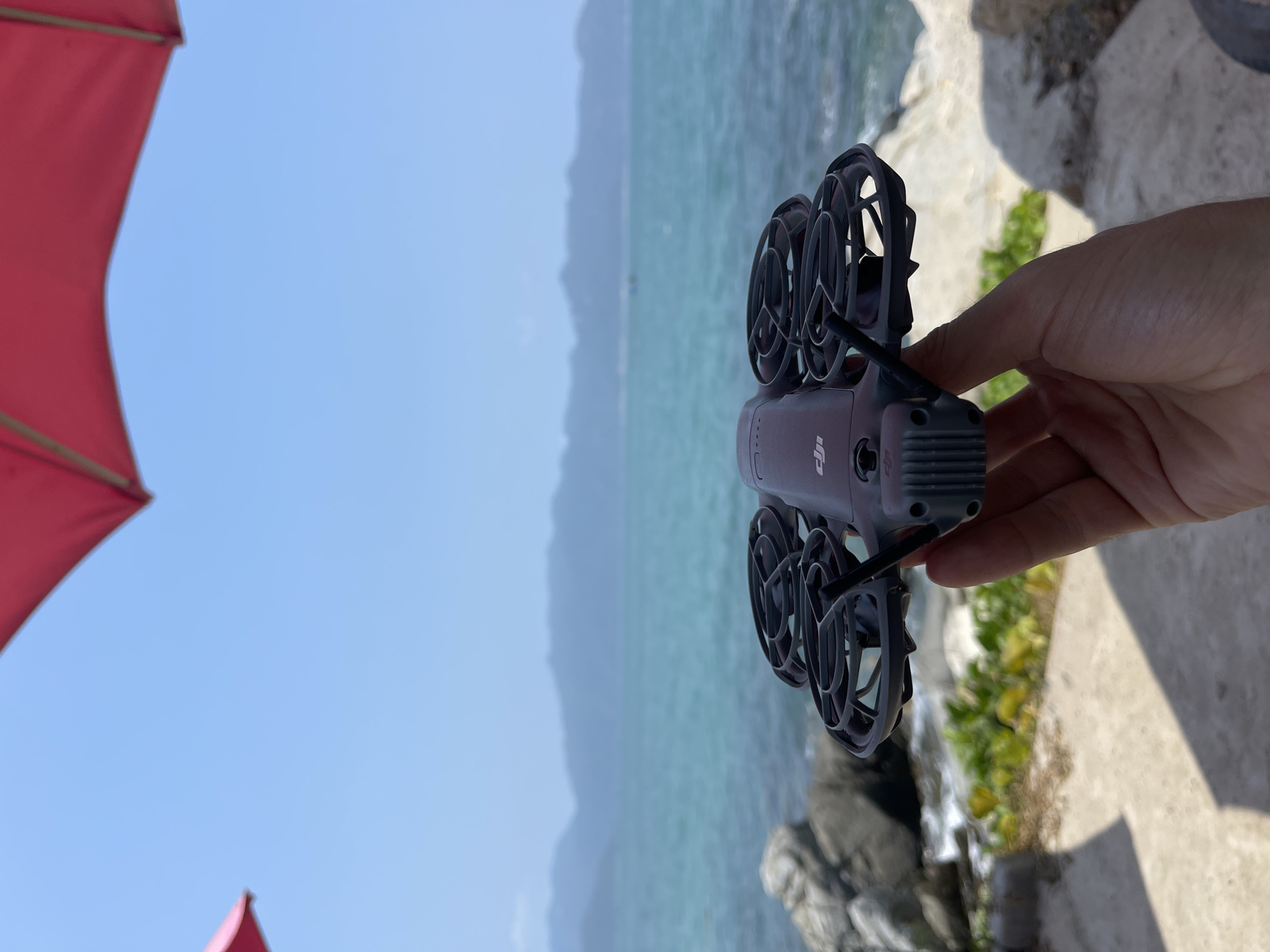 Drone operator photographed with equipment near Vietnamese coast