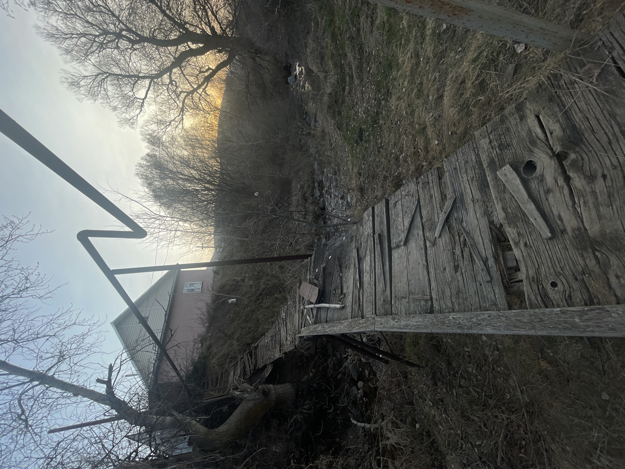 Deteriorating wooden footbridge spotted in Алмалық, Kazakhstan