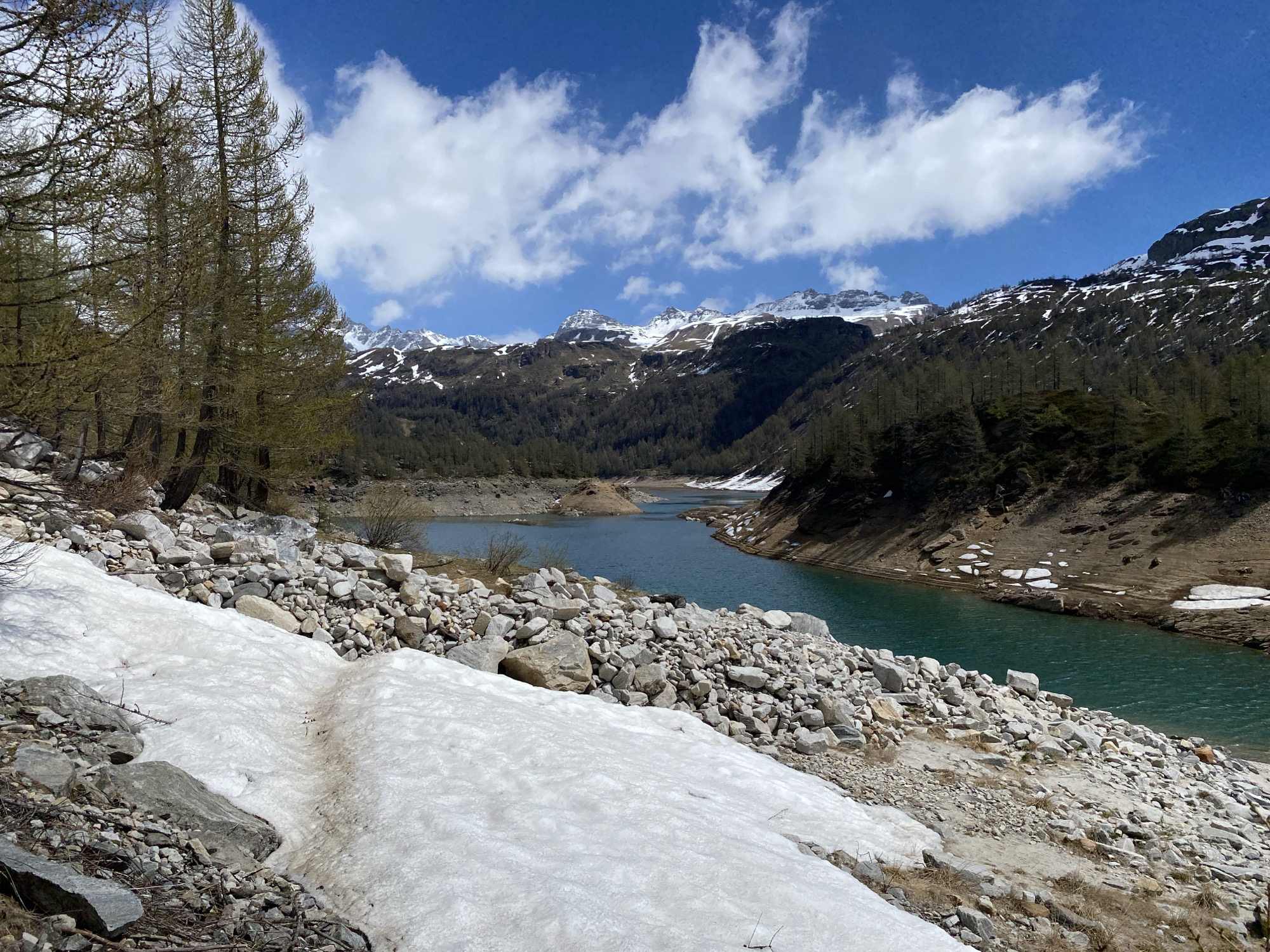 Alpine lake observed amid snow-capped mountains in Baceno, Italy