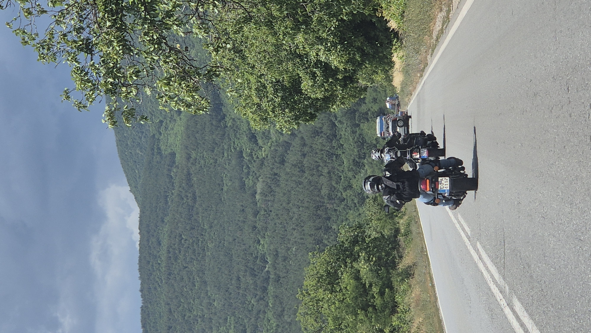 Motorcycle group rolling through rural roads near Gurkovo, Bulgaria
