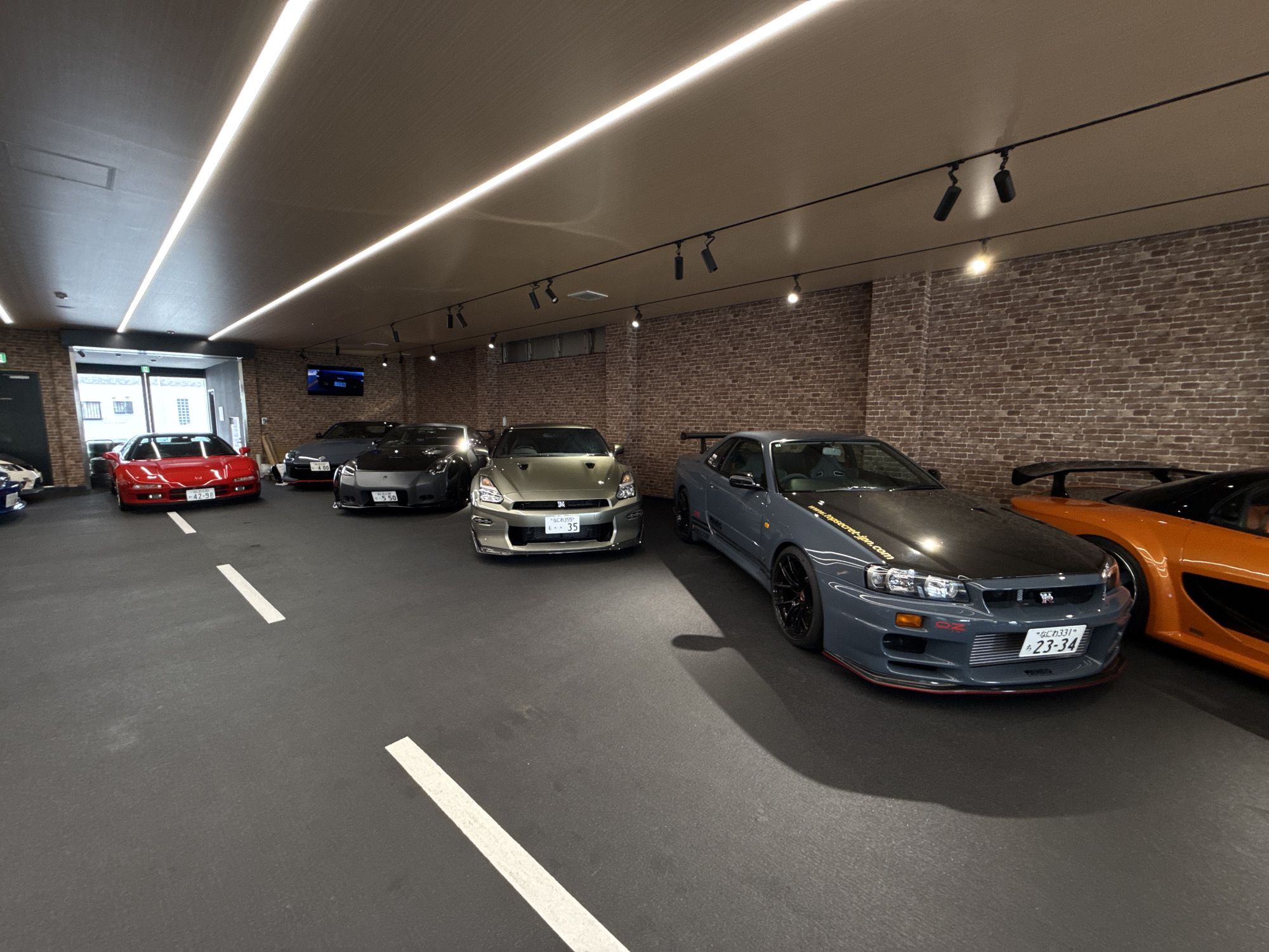 Modified sports cars displayed at Osaka car studio showroom