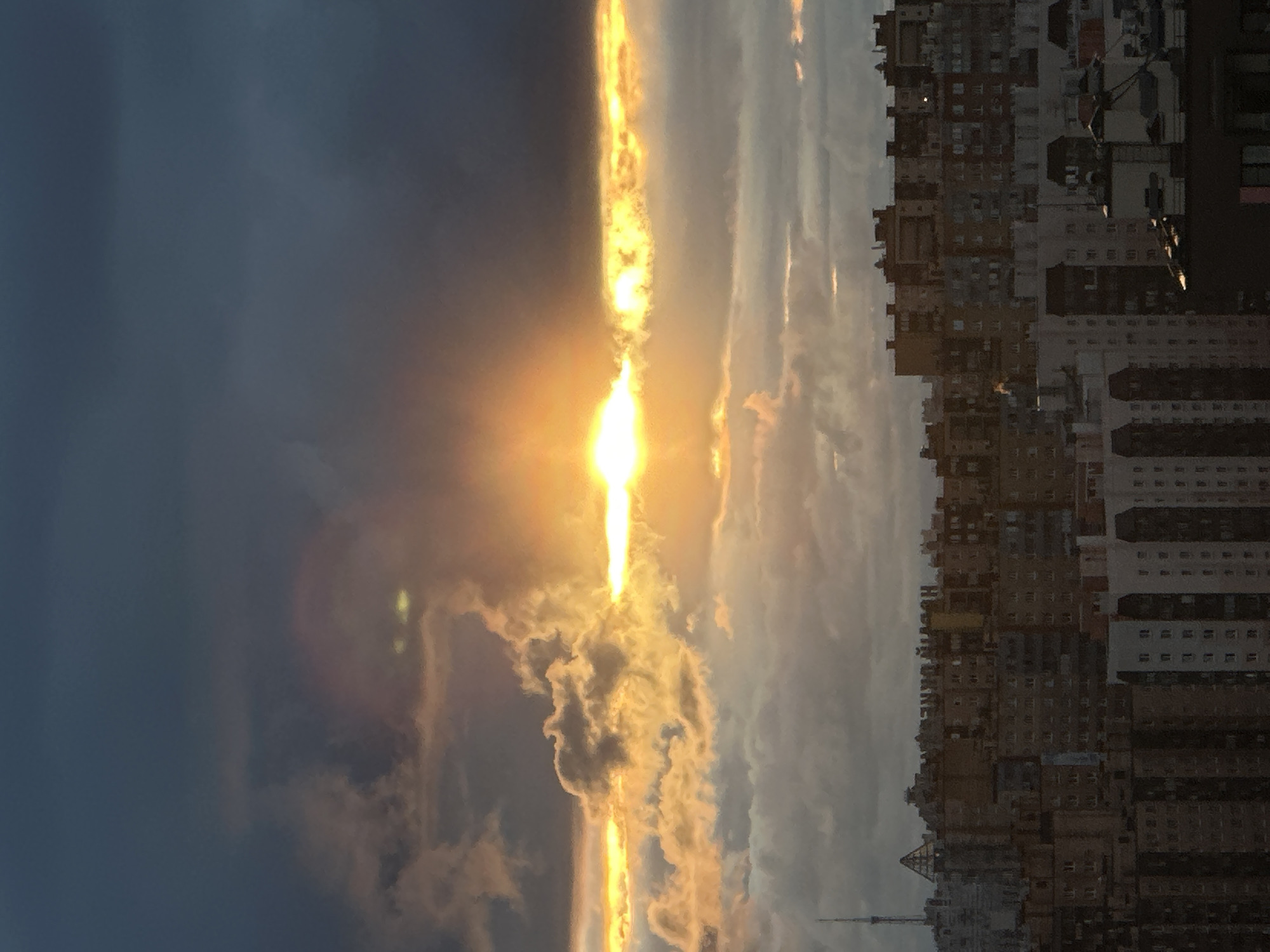 Stormy sunset and striking street sculpture somewhere in Russia