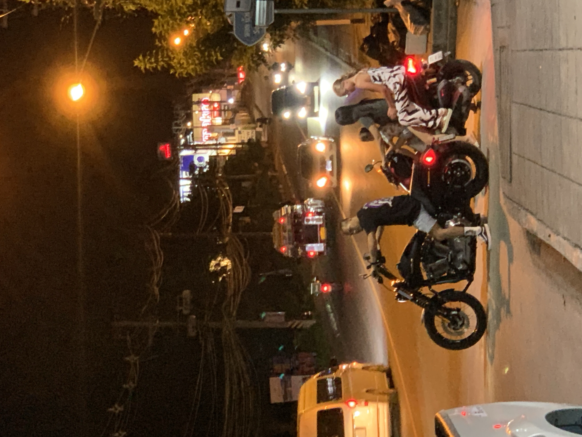 Evening street life and floral displays documented in Ko Samui