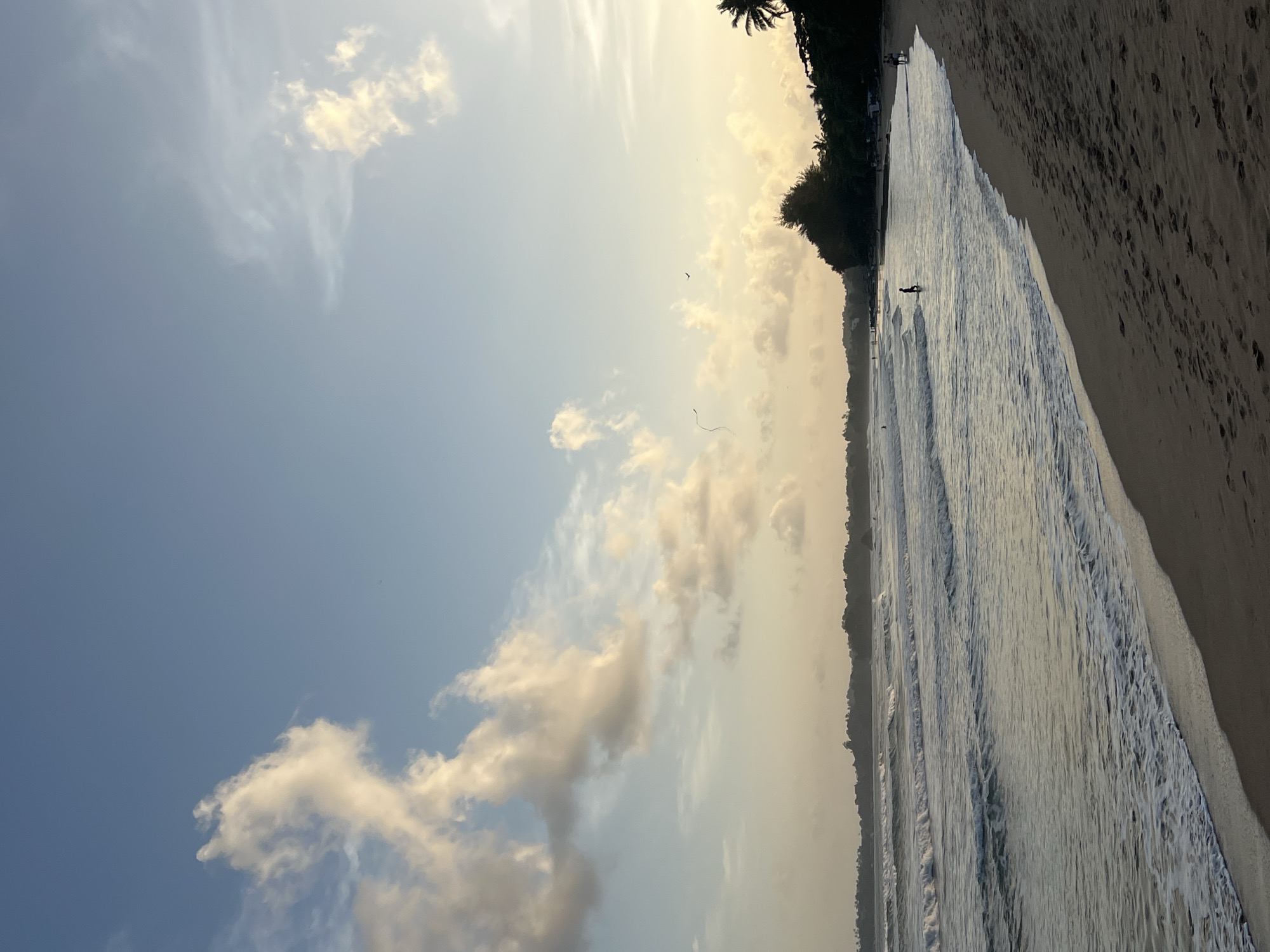 Surf and shoreline at Peleana Beach, Sri Lanka