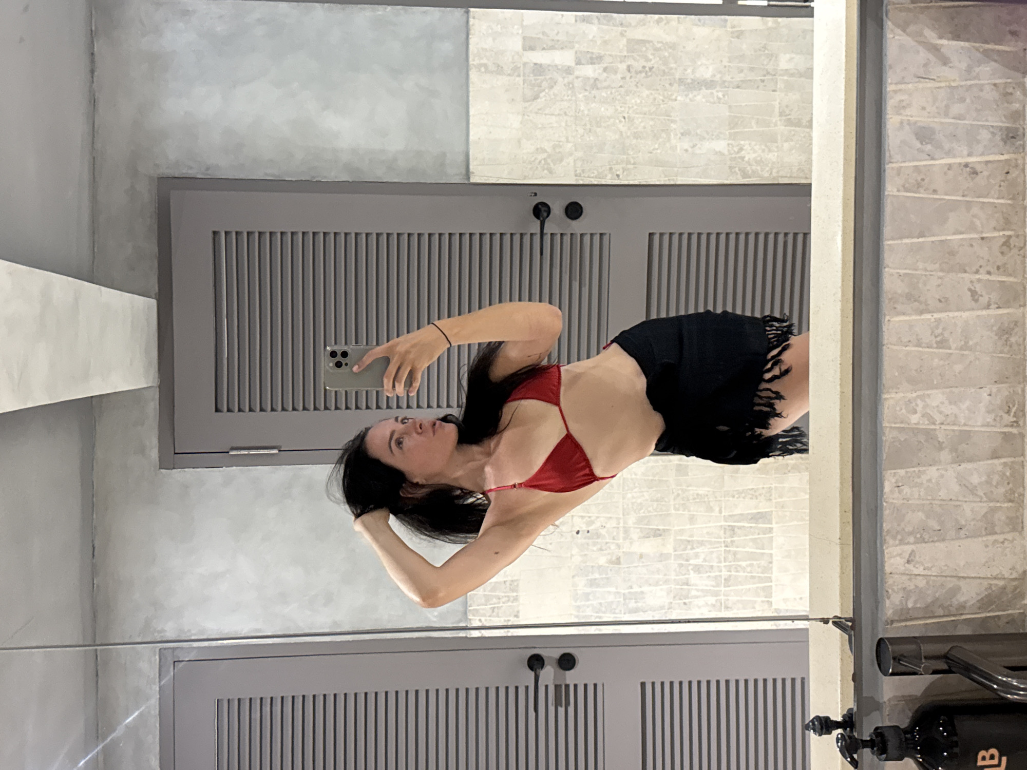 Mirror selfies in hotel bathrooms and elevators, North Kuta