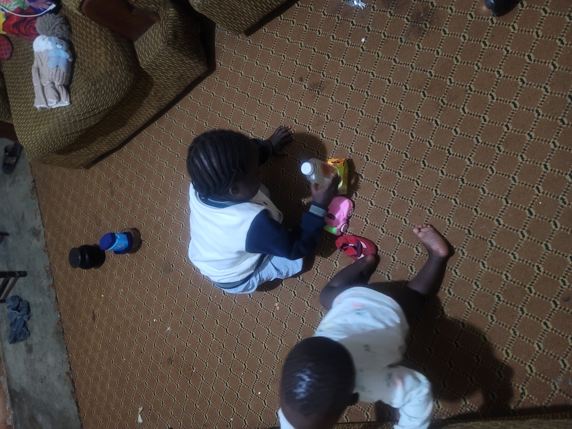 Children's quiet evening moments captured in home setting