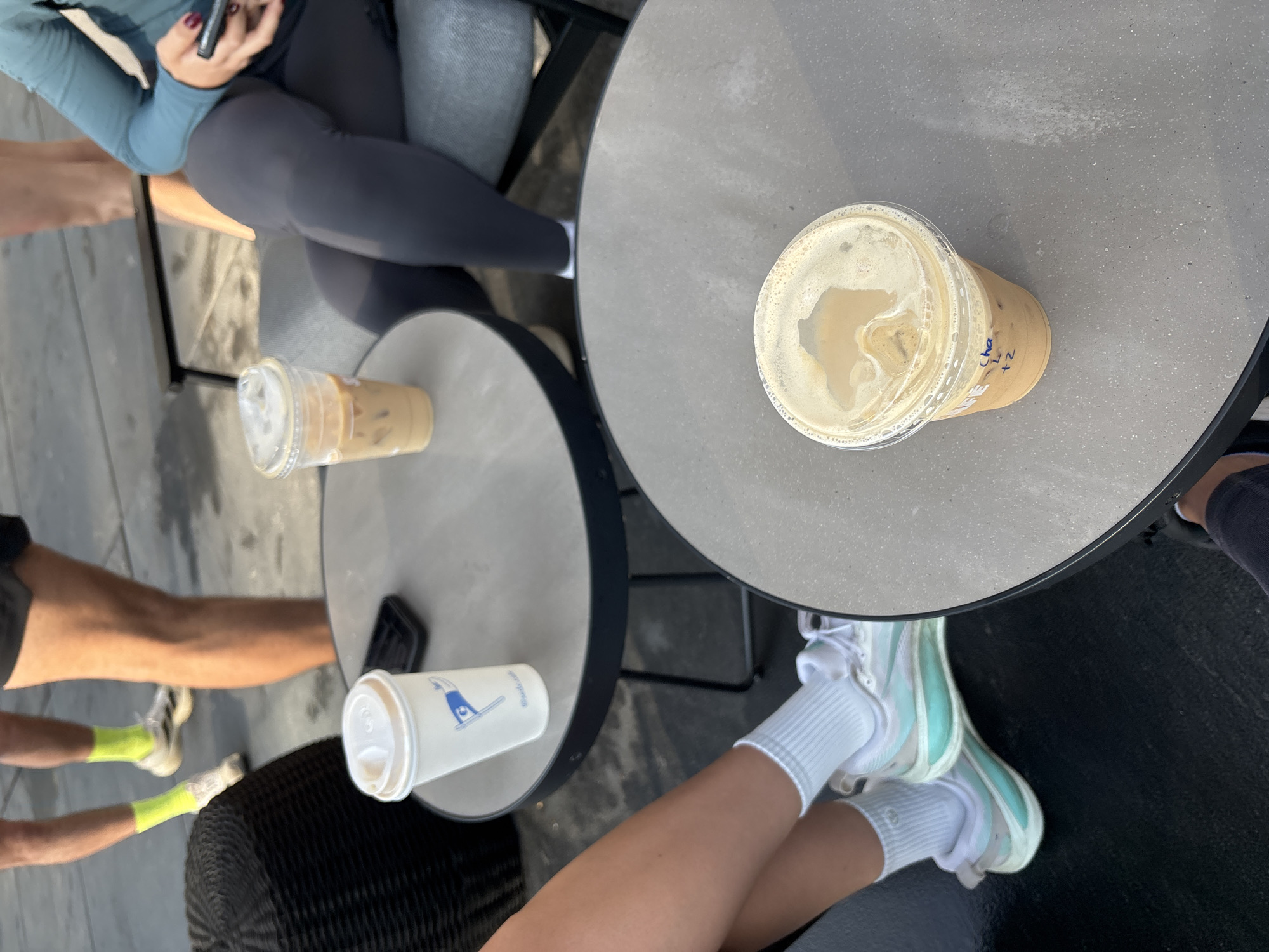 Midday cafe gathering captured in Mexico City outdoor patio