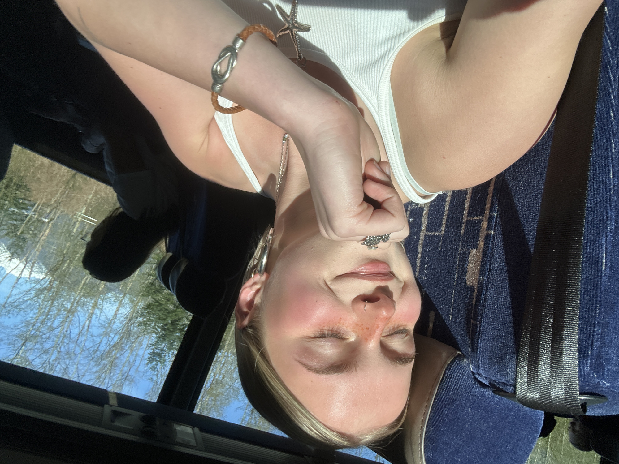 Person in white tank top observed in vehicle, Garibaldi area
