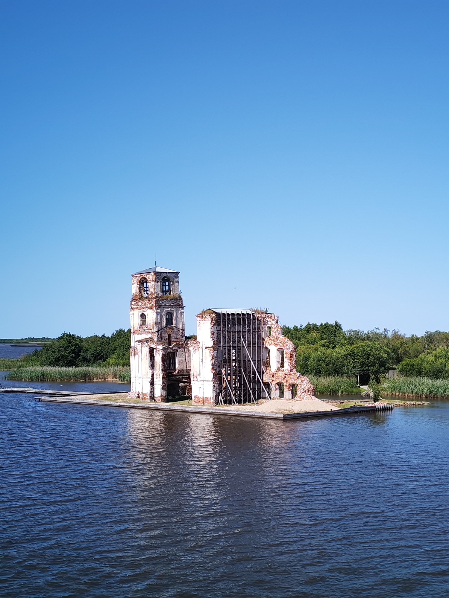Ruins of Krokhino's island church, slowly reclaimed by the river
