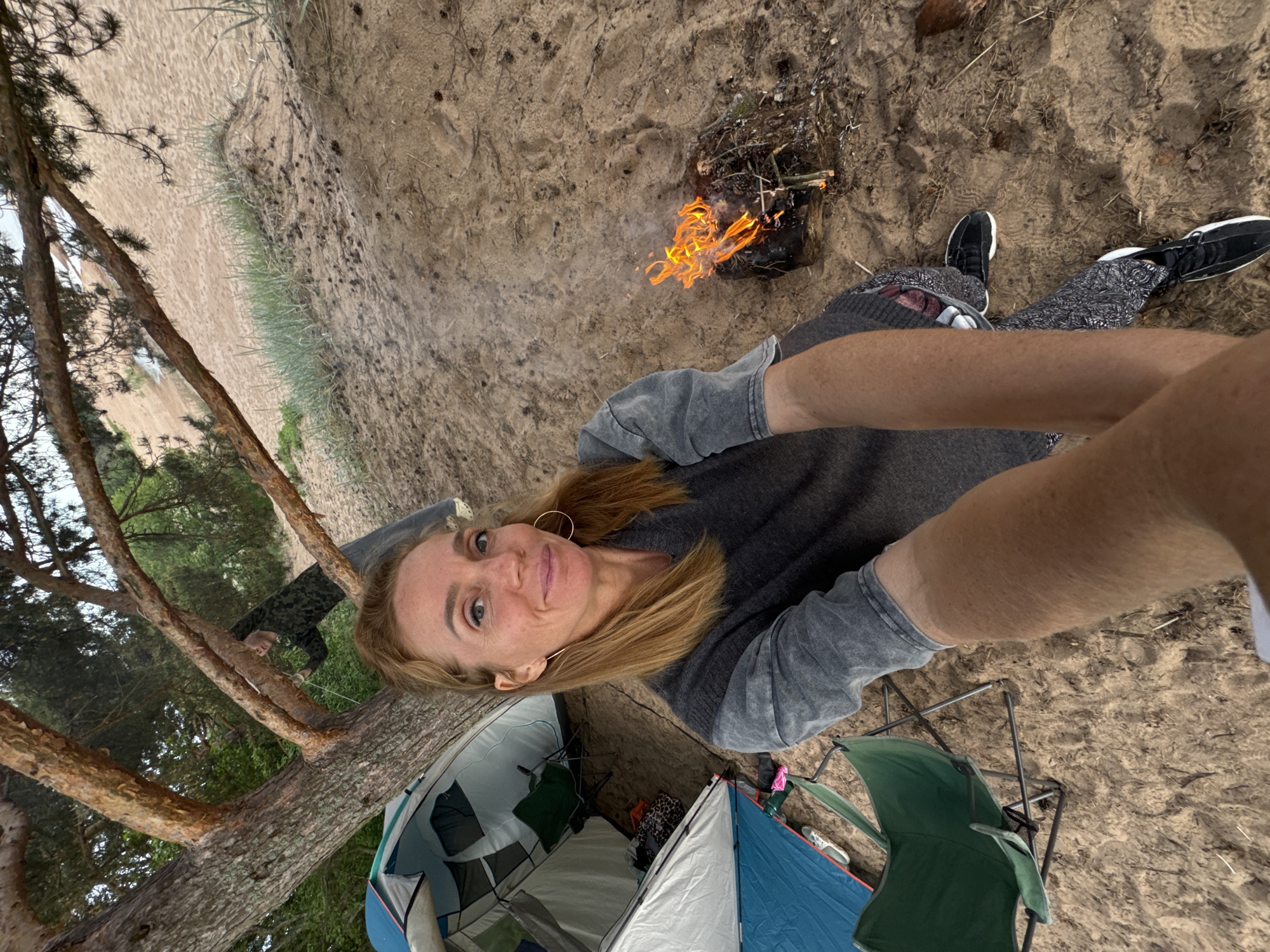 Woman documents beach camping trip in Zelenaya Roshcha, Russia