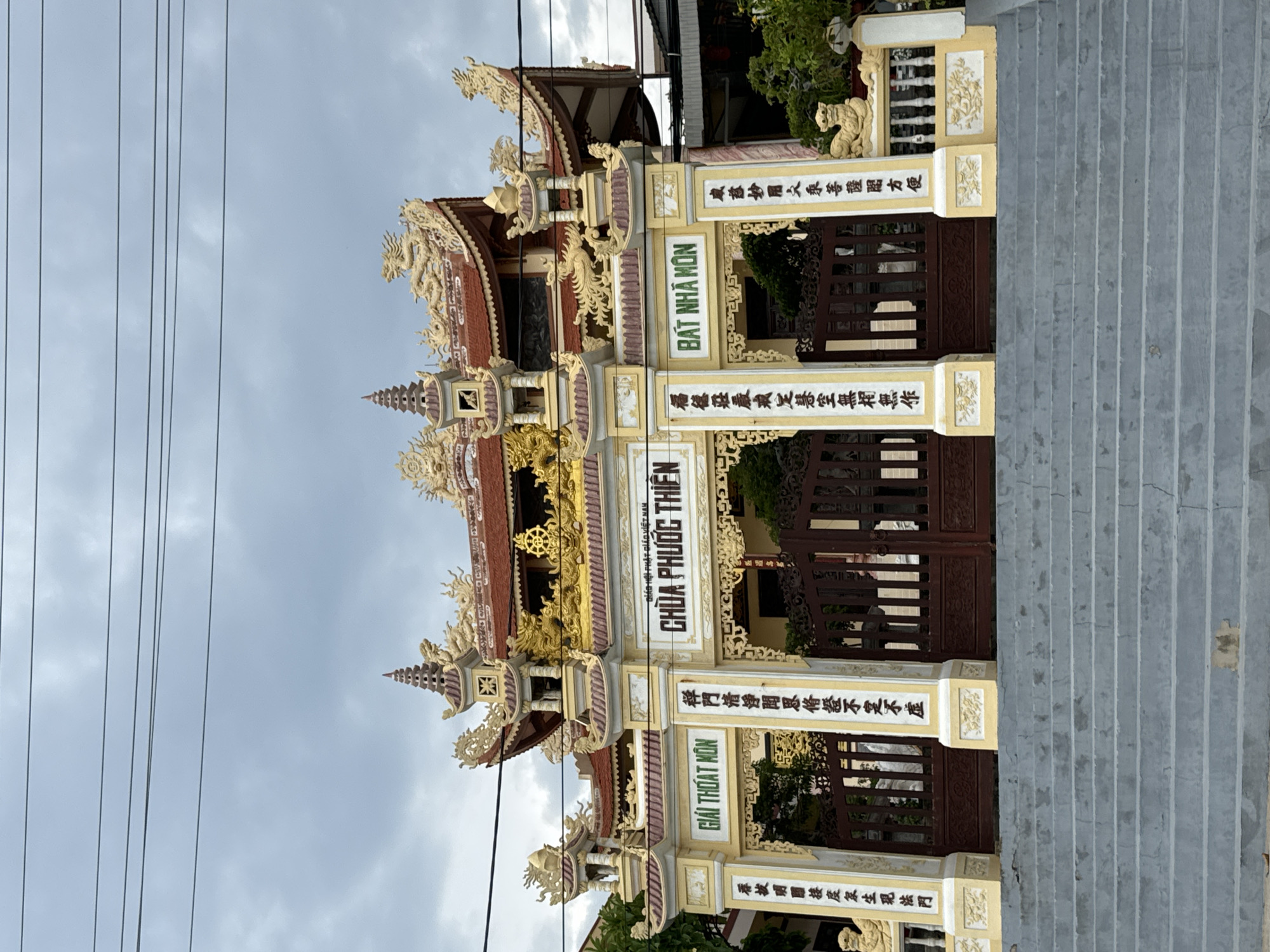 Motorcycle ride and temple stop in Phu Thuy Ward, Vietnam