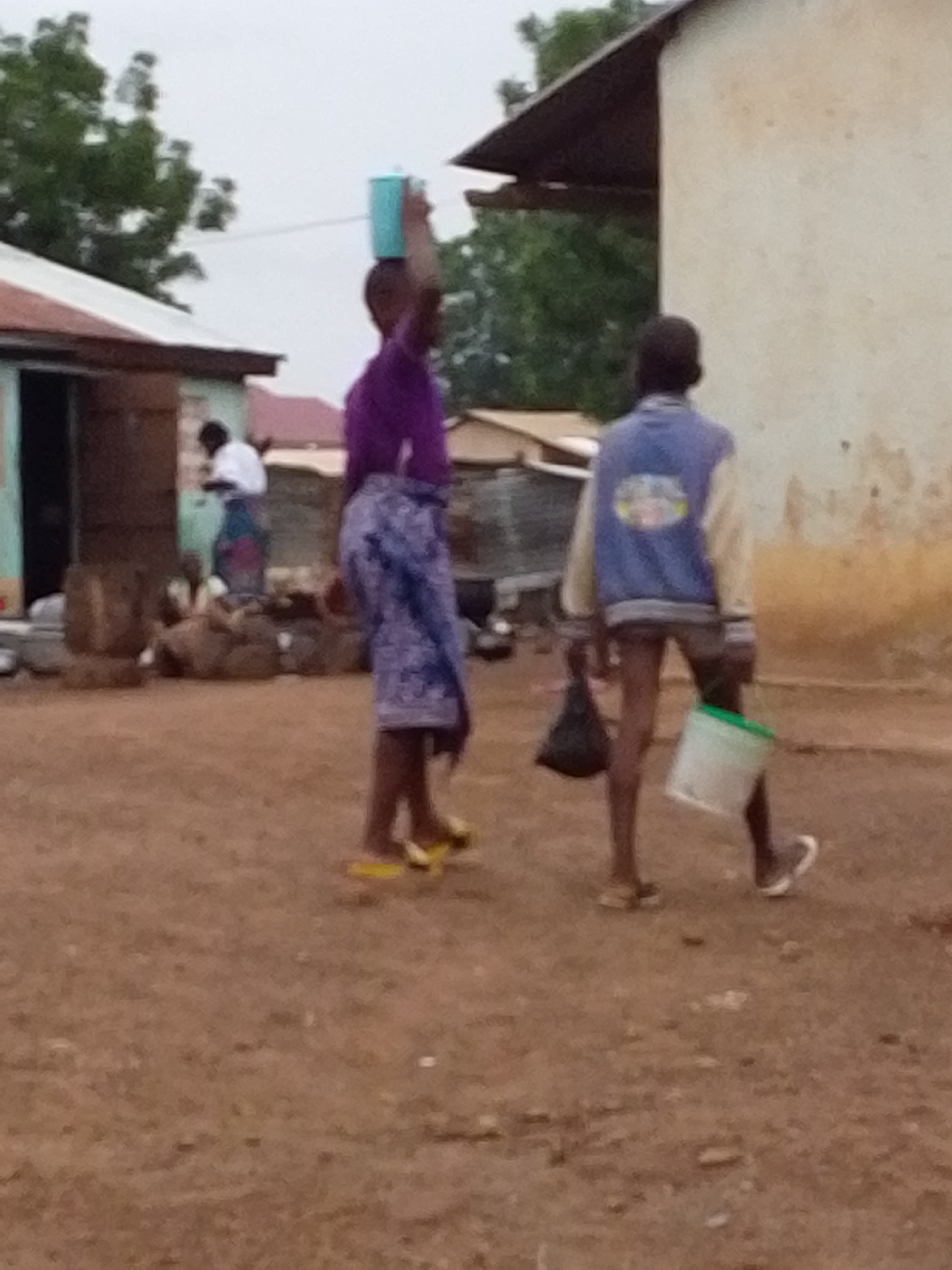 Children spotted in rural village setting during daylight