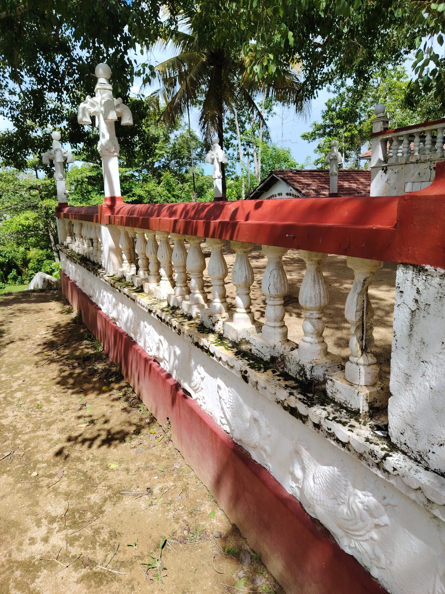 Morning walk documented at tropical temple complex in Kathalugoda
