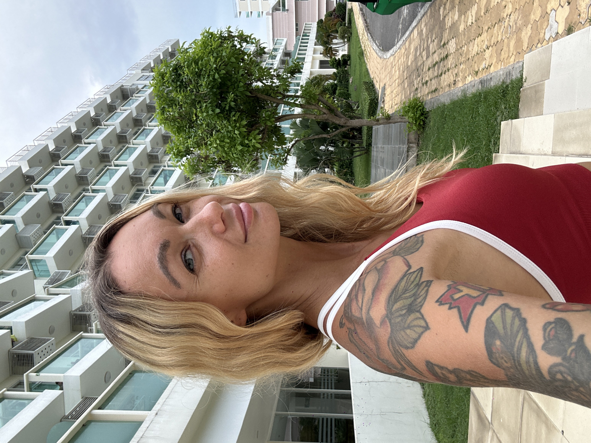 Selfie outside a modern building in Phu Thuy Ward, Vietnam