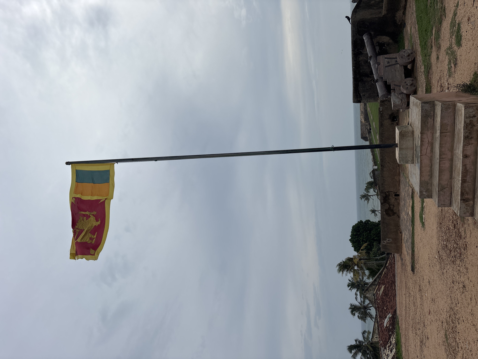 Tourist documents Galle Fort landmarks during morning visit