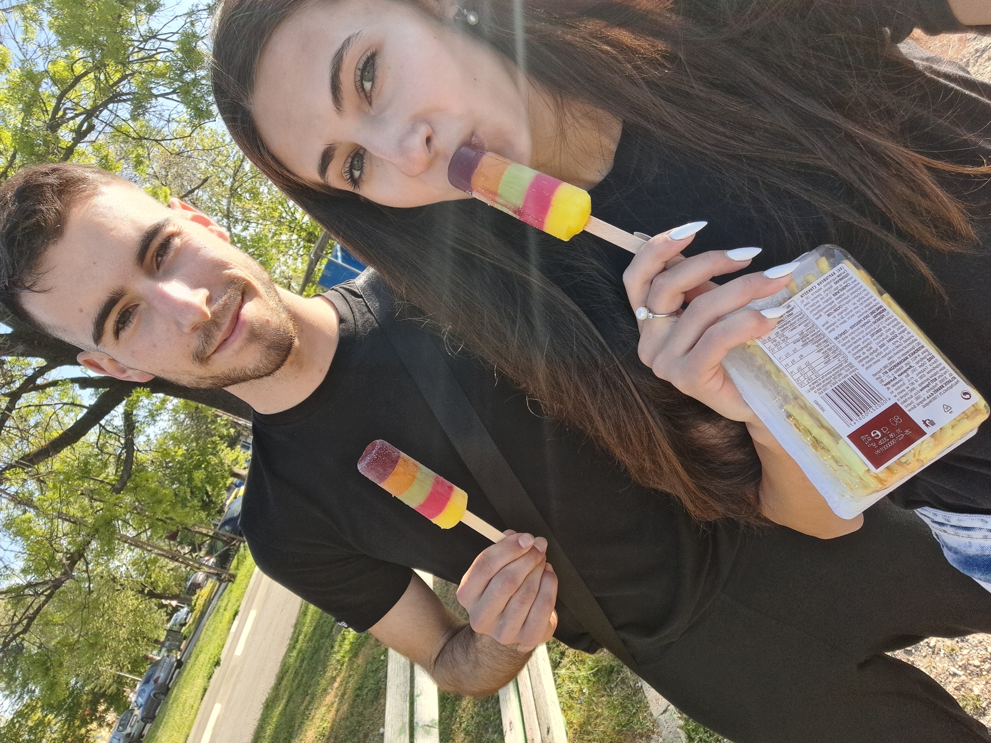 Young adults enjoy casual afternoon moments in Bulgarian village